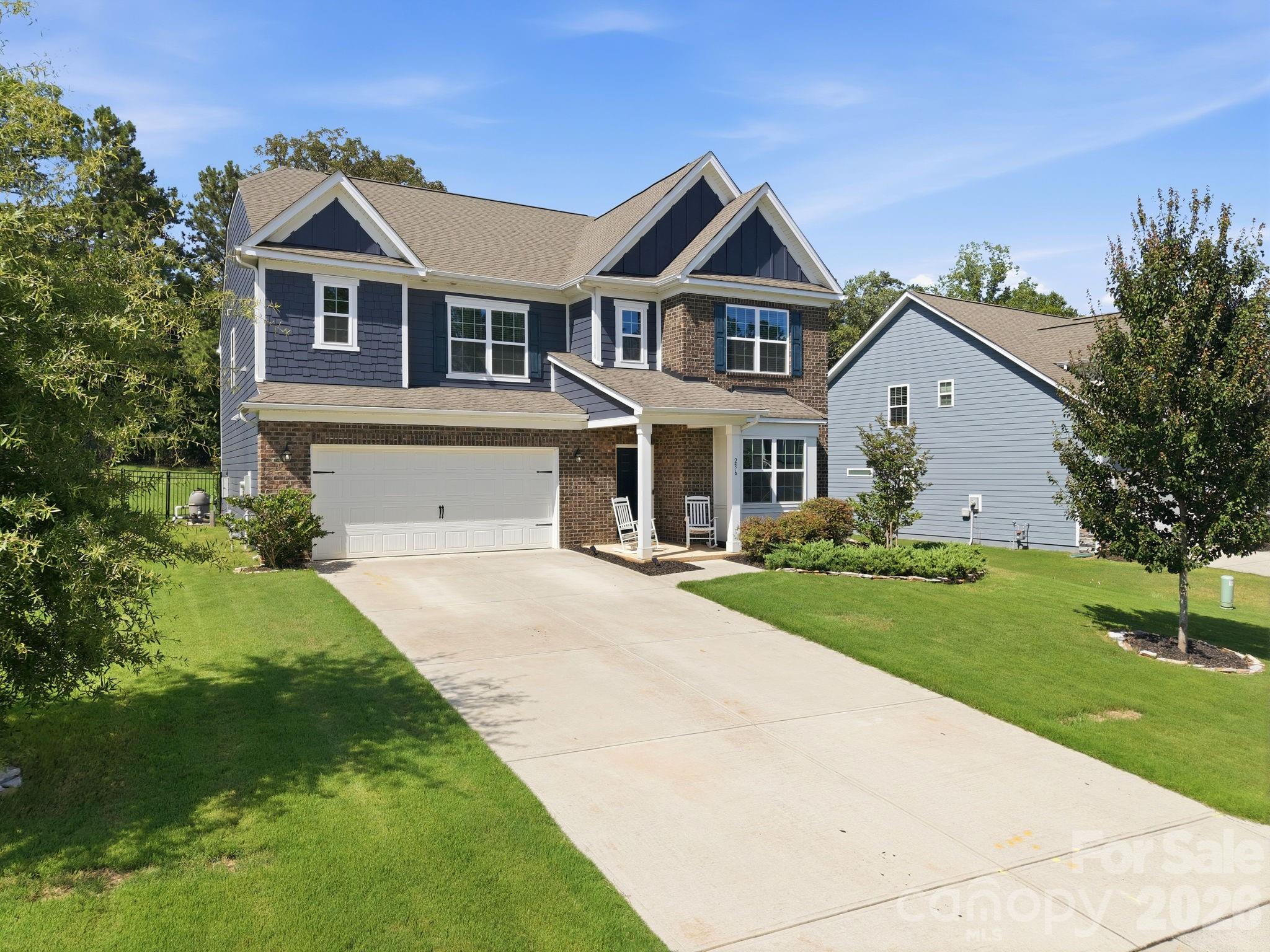 Space, style, and an incredible backyard come together in this beautifully upgraded home in Falls Cove at Lake Norman.

Welcome to 236 Tackle Box Drive in Troutman, a thoughtfully designed 5-bedroom, 4.5-bath home offering over 3,400 square feet of flexible living space in one of the area's most sought-after communities.

The versatile floor plan includes a dedicated home office or flex room, a spacious loft, and a main-level guest suite with a private full bath, perfect for visitors, multigenerational living, or added privacy. The open-concept kitchen, dining area, and living room create a bright, welcoming space that's ideal for everyday living and entertaining alike.

Step outside and discover what truly sets this home apart. The sellers invested in professionally regrading the backyard to maximize usable space before adding a beautiful custom saltwater pool, creating an outdoor retreat that's perfect for relaxing, entertaining, or making memories with family and friends.

Upstairs, you'll find a generous loft that can serve as a media room, playroom, or second living area, along with four additional bedrooms, including a spacious primary suite designed for comfort and privacy.

Life in Falls Cove at Lake Norman offers more than just a beautiful home. Residents enjoy amenities including a community clubhouse, fitness center, outdoor swimming pool with splash area, playground, and walking trails. The neighborhood is conveniently located just minutes from Lake Norman State Park, downtown Troutman, I-77, shopping, dining, and is an easy commute to Mooresville, Statesville, and Charlotte.

If you've been searching for a home that offers room to grow, flexible living spaces, and an outdoor oasis that's ready to enjoy, this one deserves a spot at the top of your list.