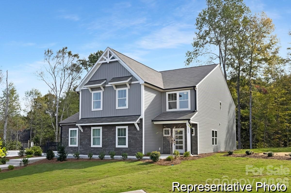 Move-In Ready Opportunity! Well-maintained former Model Home - The Gideon 3 BR / 2.5 BA with 3-car garage at Lowell Woods.  This home features private study on main level with coffered ceiling, gourmet kitchen with upgraded features such as quartz counters, porcelain farm sink, cabinetry, and more!  Upstairs is a spacious loft, perfect for entertaining guests.  The large primary suite with tray ceiling and ensuite, spacious secondary bedrooms, additional full bath, and laundry room round out the second level of this home.  Conveniently located just 6 minutes from I-85, 9 minutes from Gastonia, and 25 minutes from Uptown Charlotte, Lowell Woods provides easy access to top-rated schools, premier shopping destinations, and world-class healthcare facilities. Enjoy nearby attractions such as Kevin Loftin Riverfront Park, just 10 minutes away, and the White Water Center, a mere 20-minute drive, perfect for family outings and weekend adventures.