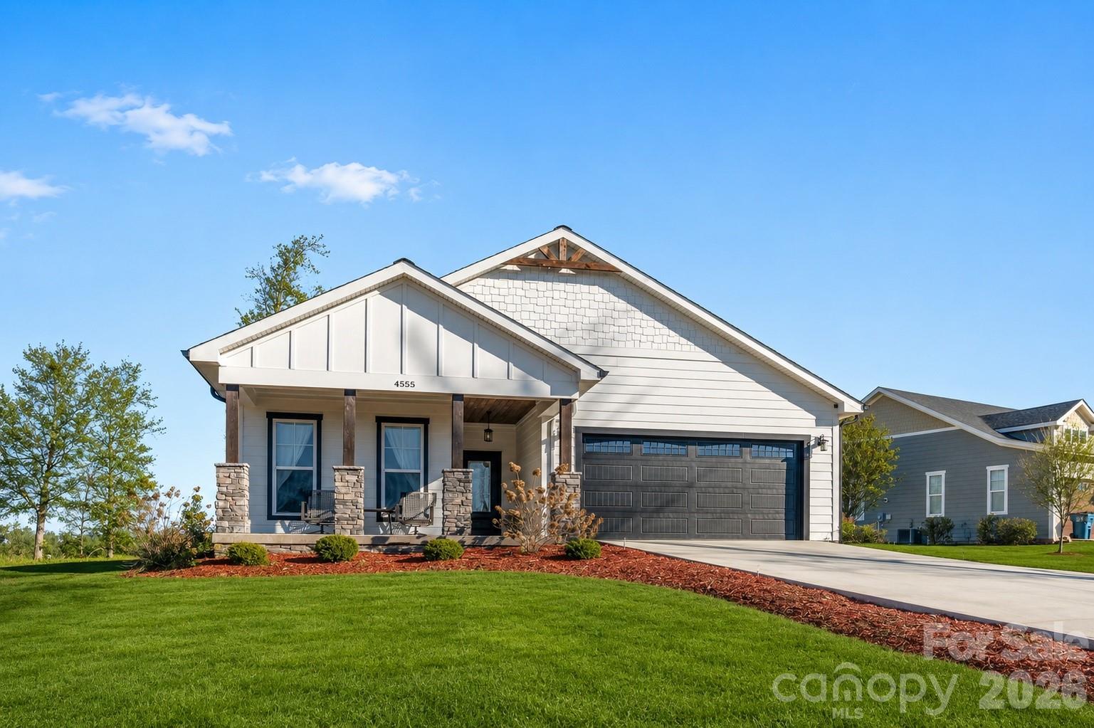 Experience luxury living in the highly sought-after Silver Creek Plantation Golf Community. This elegant patio-style home combines refined design with quality craftsmanship, offering 3 bedrooms and 2 bathrooms on a spacious 0.52-acre lot surrounded by the beauty of a 170-acre community with breathtaking mountain views.
Enjoy resort-style amenities including an 18-hole Tom Jackson–designed golf course, pro shop, restaurant and bar, clubhouse, pool, tennis and pickleball courts, and fishing ponds. Inside, the open-concept layout showcases wide plank luxury flooring, oversized windows, custom cabinetry, granite countertops, and 9-foot ceilings throughout. The gourmet kitchen features a large island, pull-out cabinet drawers, stainless steel appliances with a gas range, and a wine/coffee station complete with a beverage fridge. Conveniently located off the garage is a versatile space ideal for a desk or drop zone, adjacent to a large closet/pantry. The oversized laundry room includes built-in cabinets, a mud sink, and a hanging area for added functionality.The primary suite offers a spacious retreat with a custom-tiled walk-in shower featuring a rain head, dual vanity, private toilet, and walk-in closet. Additional highlights include an LED/Bluetooth mirror, zero-height entry, tankless water heater, and covered front and back porches —perfect for relaxing and taking in the serene surroundings. Discover refined comfort and timeless style in this exceptional Silver Creek Plantation home.