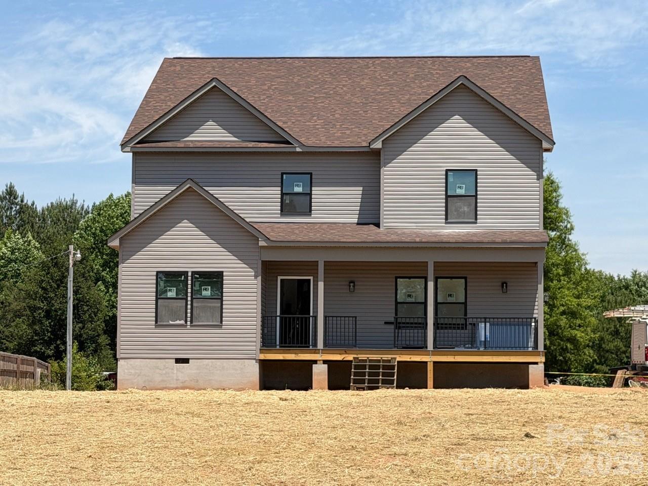 Discover modern farmhouse elegance within a serene country setting in the highly sought after Cool Springs area. This stunning 3-bedroom home blends classic appeal w/contemporary design. The open floor plan of the kitchen, dining and living areas are perfect for entertaining and everyday living. The Main Level Primary Suite offers a private retreat. Two additional bedrooms upstairs and a spacious loft. Additionally, there is a Room with an en-suite bathroom that is ideal for a home office/craft room or guest space. Front and Rear covered porches.