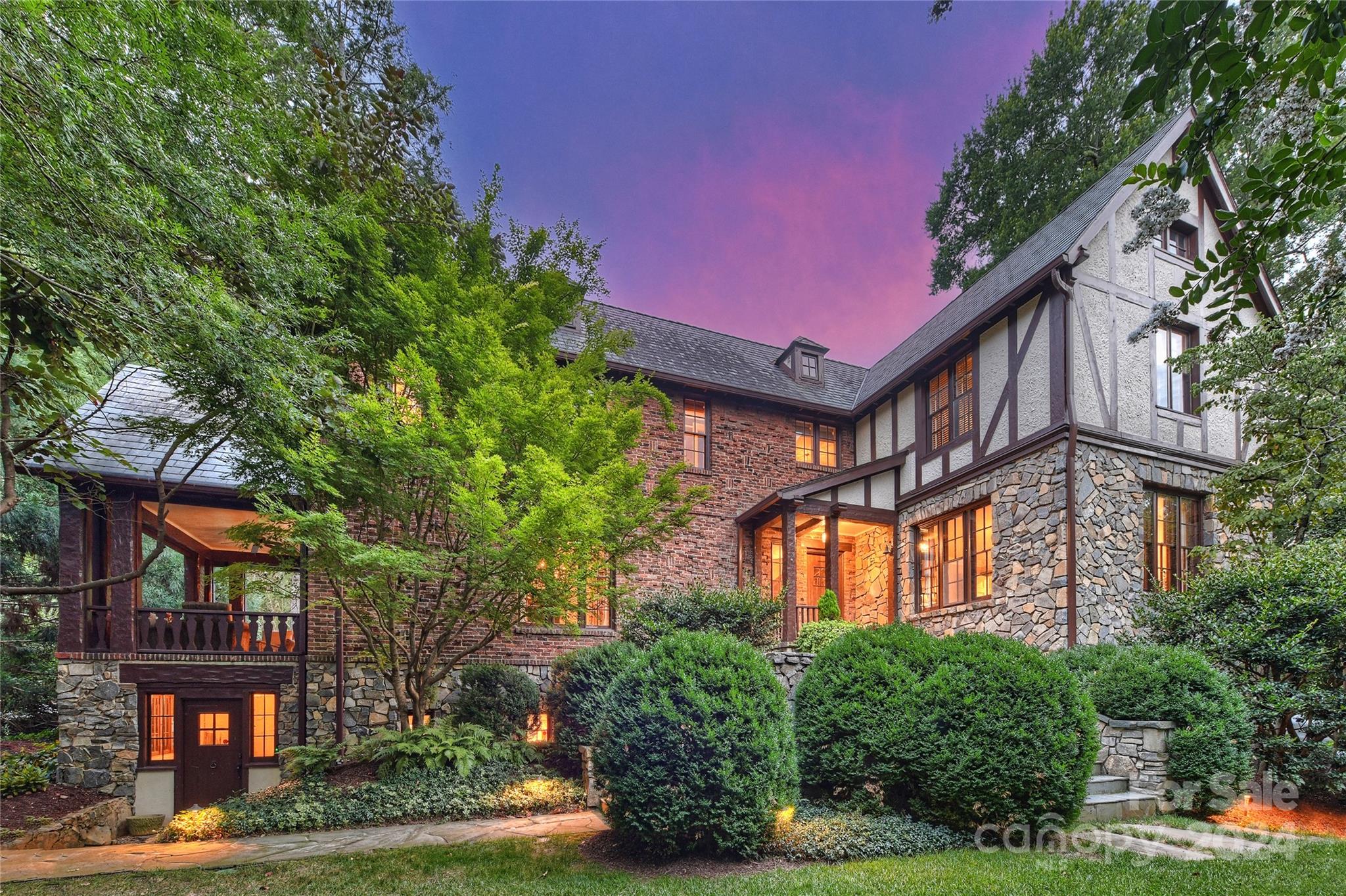 This elegant 5-bedroom Tudor-style home combines historic charm with modern comfort. A classic home with  preserved historic details throughout, from the stately dining room and foyer to the comfortable living areas. Each room provides a sense of grace and history, inviting you to relax and unwind. Every bedroom has updated en suite bathrooms and beautiful windows overlooking a lush, private landscaped yard.
Whether you're hosting intimate gatherings, lavish parties, or family get-togethers, this home provides a welcoming backdrop that connects the past with the present. Wonderful opportunity to own this unique property where privacy, architectural charm, and timeless beauty come together to create a truly special living space.
