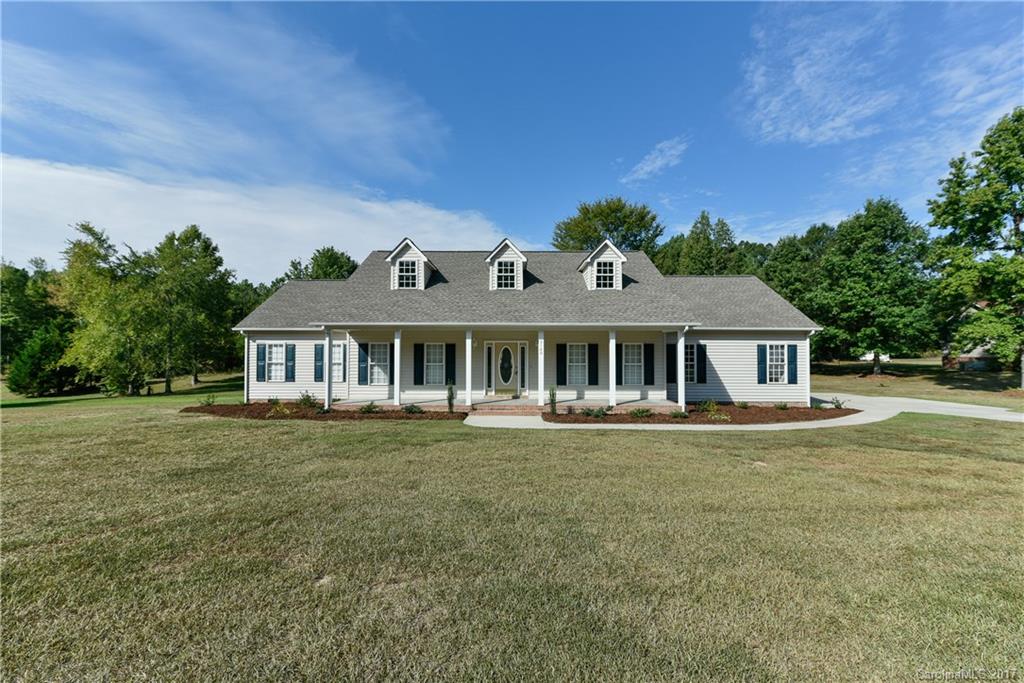 Pull up to this cute as can be house and admire the beautiful curb appeal and rocking chair front porch.  Enjoy the fireplace in the great room on cold evenings.  Large eat in kitchen with french doors leading out to the deck.  Roomy owner's suite has master bath with corner garden tub and separate shower.  Large, level yard with separate wired outbuilding for storage.  Back deck perfect for relaxing or entertaining.  Partially finished bonus upstairs. Move in ready - this wont last long!