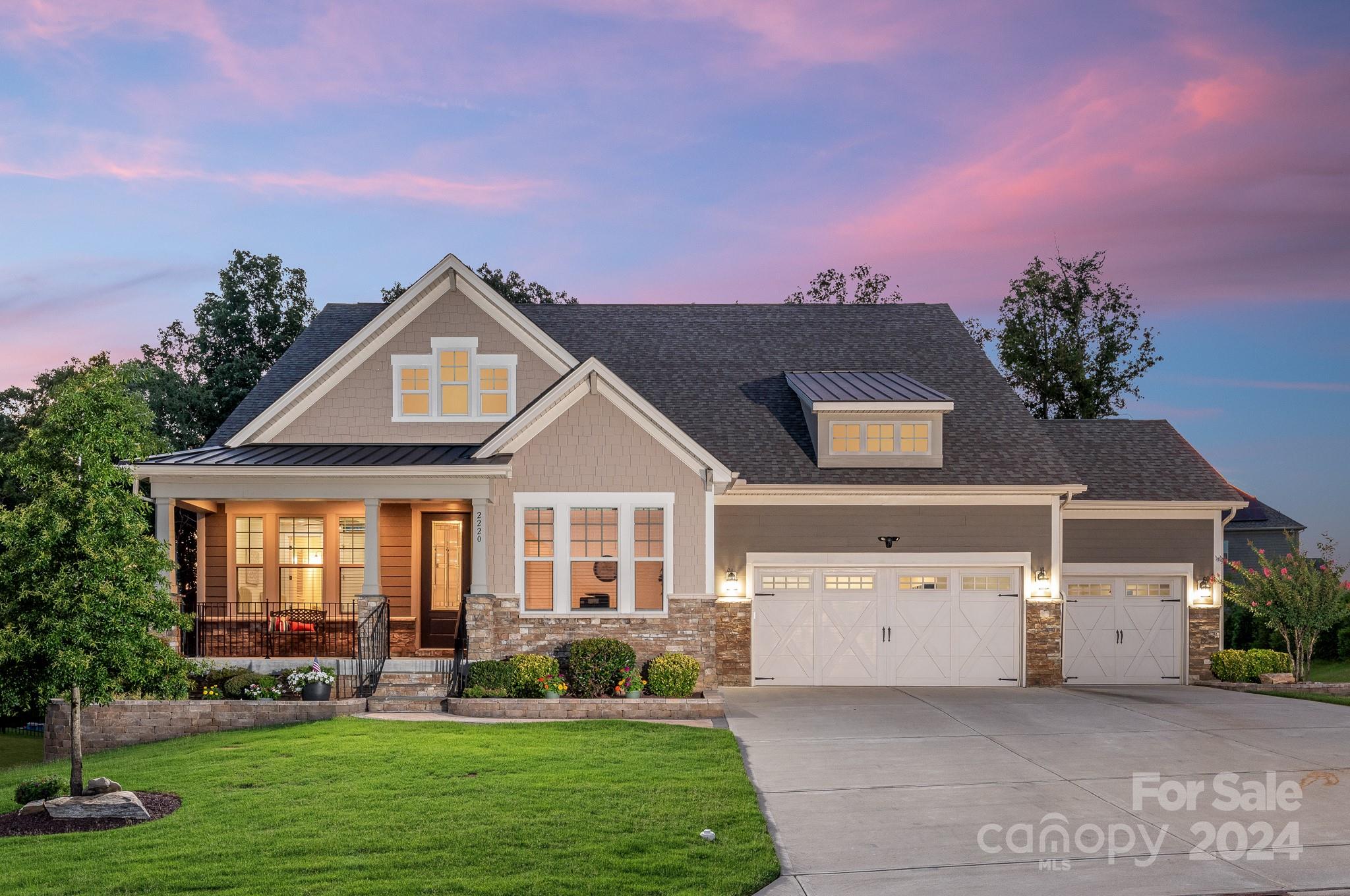 Situated in the fabulous Bent Creek community, you’re minutes away from great schools, shopping, & dining options. This home provides ample room for comfortable living & entertaining. The modern kitchen boasts granite countertops, stainless steel appliances, a large center island, & custom cabinetry—ideal for the home chef. The inviting open floor plan seamlessly connects the kitchen, dining area, and living room, creating a warm and welcoming atmosphere. Retreat to your private oasis in the expansive Primary Suite on the main level, featuring a walk-in closet and a spa-like en-suite bathroom with a luxurious shower offering multiple heads and custom niches for storage. A versatile basement bonus room offers endless possibilities—use it as a playroom, media room, or home gym. This home is equipped with smart home features, including a programmable thermostat and energy-efficient appliances. This home also boasts the perfect man-cave - an almost 1,000 sq ft of garage with epoxy floors.