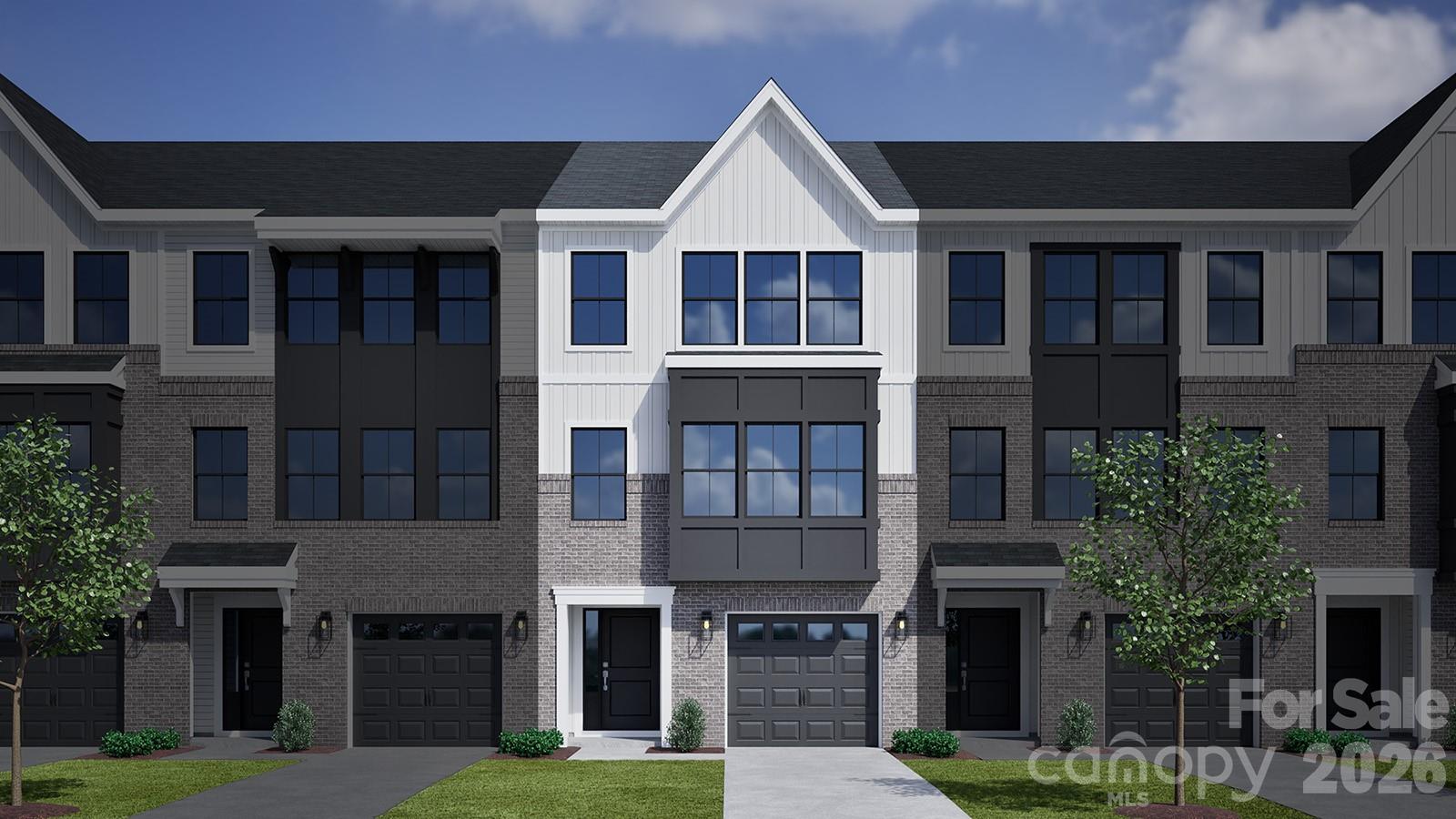 This three-story townhome includes three bedrooms, two-and-one-half bathrooms, and a one-car garage. The porch and garage entrances lead to a bonus room with an optional fireplace and patio, that can be converted into a guest bedroom, featuring a full bathroom. The garage entrance offers an optional bench and cubby or organizational cabinet. The first flight of stairs leads to the open concept kitchen with optional deck, eat-in area and great room with an optional fireplace. A powder room completes the second floor. The third floor includes the primary suite with dual walk-in closets and an optional boxed ceiling and dual vanities. Down the hall, you will find two secondary bedrooms and one full bathroom. A laundry closet is located just outside of the secondary bedrooms for ultimate convenience. There is an alternate third floor plan that offers a dual primary suite with a walk-in closet and en suite bathroom in lieu of the two secondary bedrooms.