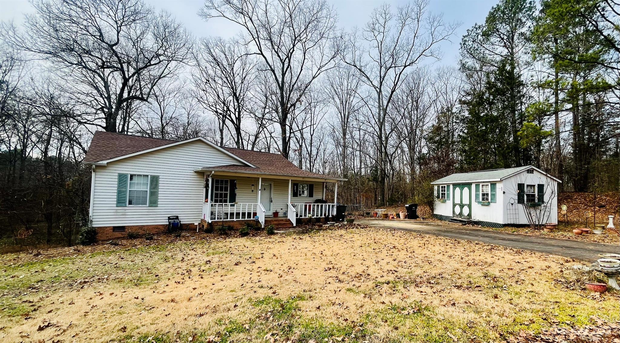 Unlock the potential of 1912 Pinevalley Rd, a spacious 3-bedroom haven in Rock Hill's serene neighborhood. Resting on 0.43 acres, this home boasts a sun-kissed sunroom, a warm fireplace, and ample outdoor space with a fenced backyard. The bonus workshop is perfect for crafting your dreams. Ideal for those who see beauty in transformation and value in customization.