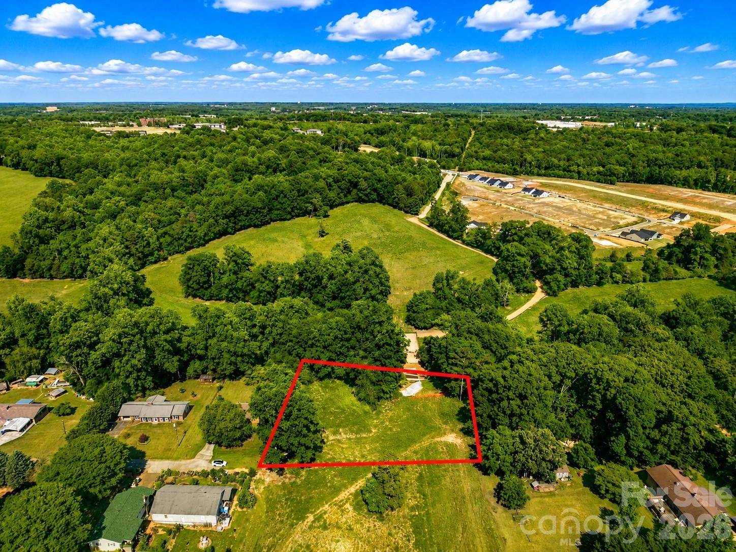 Build your future on this 1.08-acre lot in Newton, NC, located in desirable Catawba County. Tucked off Kent Dr., this property offers privacy and potential, with nearby homes and electric available in the area. 

A community well is available for water. Seller is currently confirming whether the property would require septic or has access to county sewer, as surrounding homes utilize both. 

Please note: Kent Dr. does not currently extend all the way to the property, so buyer would need to install access depending on intended use. 

Great opportunity priced at just $24,000! APN #3711-15-53-9845