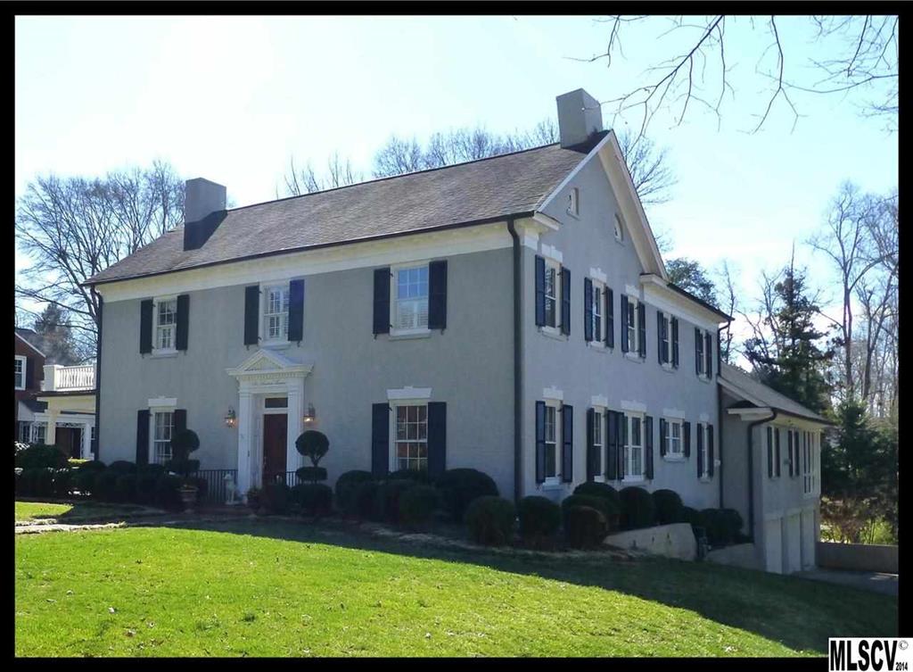 Gorgeous home in the historic Oakwood area of downtown Hickory w/in-ground pool and 3 car garage....lovely & very rare find! Calcutta marble flooring in foyer, beautiful crown moldings, 9+ ceilings, & hardwood floors throughout most of the home. Formal living room has gas log FP & access to the covered side patio. Formal dining room. Remodeled kitchen offers granite countertops, center island, custom cabinets, updated appliances, & a breakfast area. Good sized den on back of home boasts vaulted ceilings, gas log FP, hardwood flrs, & leads to the relaxing screened porch which overlooks the in-ground pool & backyard. Main level laundry rm & pantry. The master BR has its own priv.bath w/his & her WICs(cedar), clawed footed tub, sep. shwr, & granite tops. 2nd BR on upper lvl inclds another gas log FP & accesses the upper balcony/deck. Full, unfinished bsmt....storage, workshop, 3 car garage, etc. 0.51 acre lot. Move-in ready...Character & Charm! Owner is a NC Licensed Real Estate Broker.