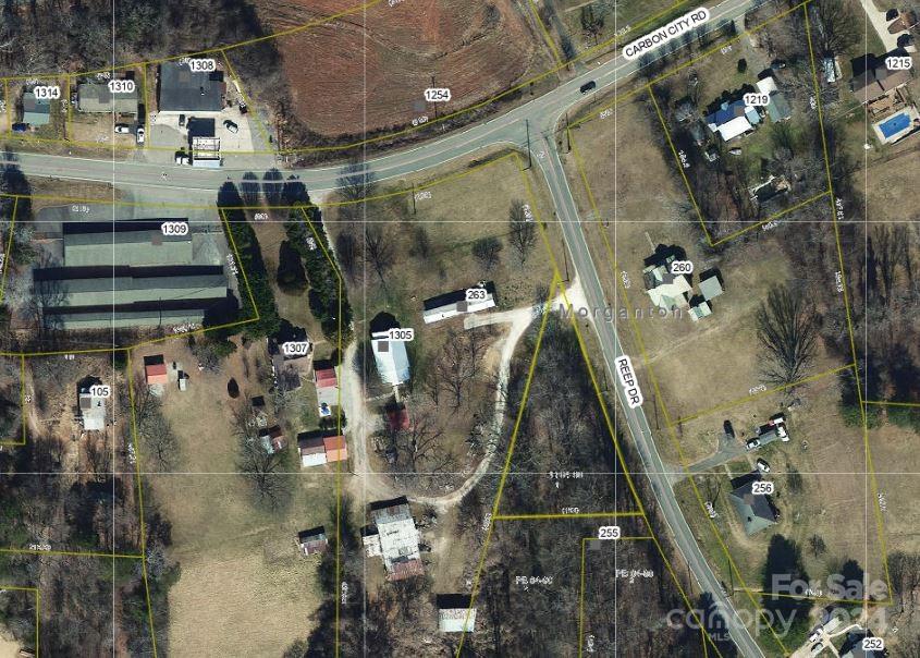 NEW ON MARKETt over 1/2 acre lot located in Morganton, will allow a modular home or site built. Located on  near big daddy's gas station on carbon city Rd. Property has access to county water and county sewer. Property has no restrictions a tiny house we'll go there, or a  standard home. Property is located near Morganton shopping and restaurants near I-40 exit 100. Near  schools parks  Lake James  Golf Coures Driving Range  Movie Theaters.