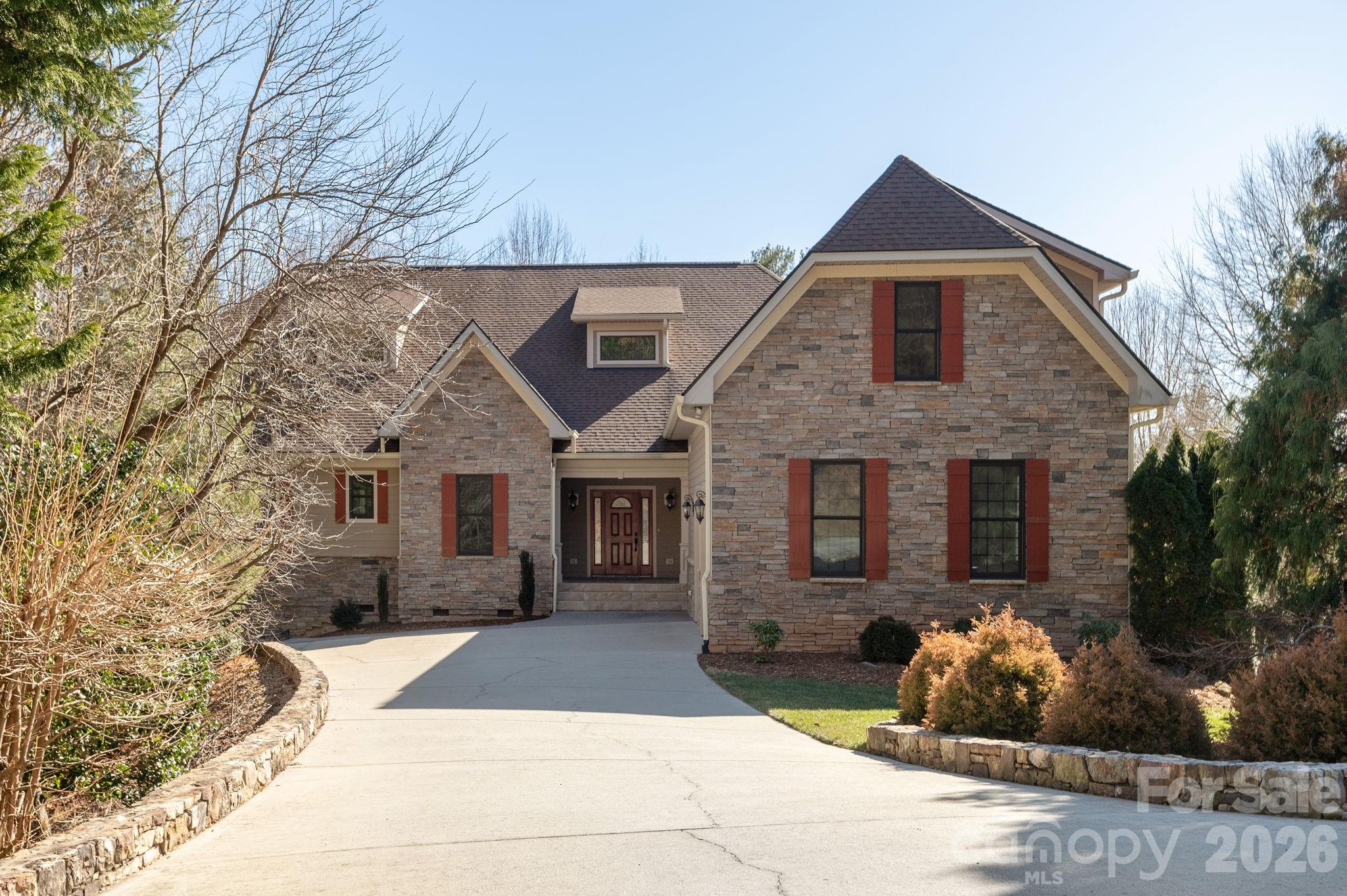 Updated home located in beautiful Wilson Farm on private estate lot. Thoughtful floor plan and attention to detail with high end finishes and craftsmanship. Designed for easy main level living that features the primary bedroom and two guest bedrooms all with ensuite bathrooms. Main level also has an office with a fire place, kitchen with upscale appliances, dining room, breakfast room, great room and laundry. Tile and hardwood floors throughout the main level. Screened porch is perfect for entertaining and taking in the mountain views. Upstairs bonus room could serve as a media room, office or craft room. Lower level has a family room with a fire place, kitchenette, game room and full bath.