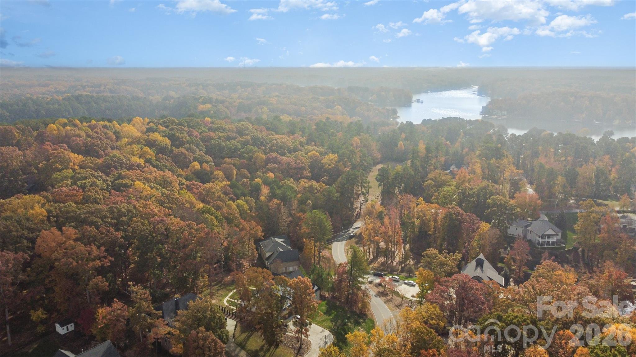 Discover the potential of this beautiful 1.80-acre lot overlooking Lake Norman in the peaceful Greenbay Forest community. Tucked away in a quiet, natural setting, yet only 4 miles from I-77 (Exit 36) and minutes from Hwy 150, this property offers the perfect balance of privacy and accessibility. The community requires a minimum 2,200 sq ft build for single story and 3,000 for 2 story, ensuring quality and consistency among neighboring homes. Whether you’re envisioning a custom dream home, a luxury lake retreat, or an investment property for Airbnb or long-term rental, this lot delivers endless opportunity. A previous septic permit was issued (now expired), and no current permit is on record with Iredell County. Create your own private getaway surrounded by the tranquility of Lake Norman living.