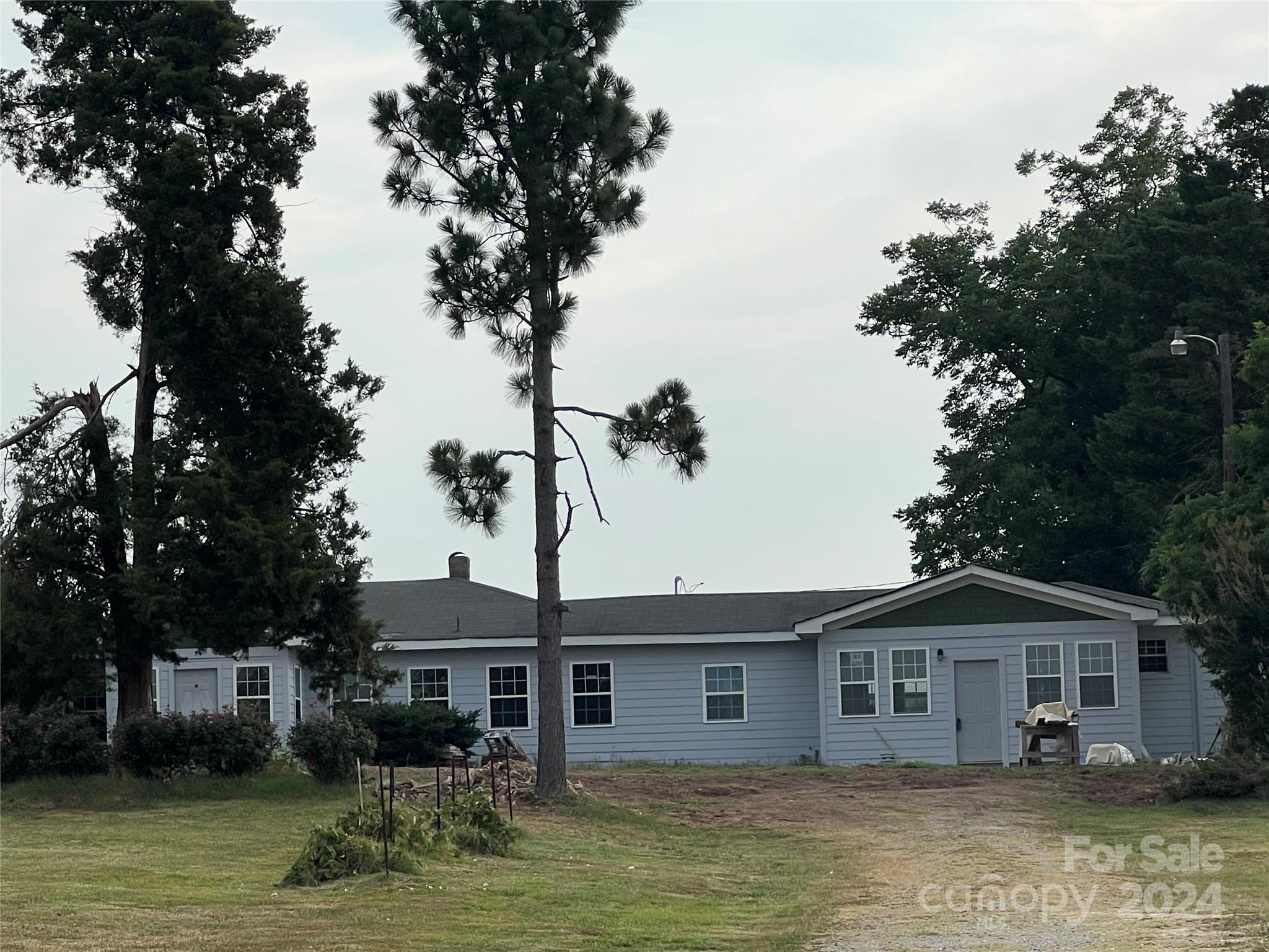 Spacious! Droped price!! Rare to find over 4 acres house all renovated and improved. About 40 mins from Charlotte. If you compare with previous house condition, you are gonna suprise how much what seller did. Yard is cleared. The seller added sunroom, include one entrace but those rooms are unheated. . Beautiful hardwood through out whole house. No carpet in this house. 2 full bathrooms completely remodeled. Crown moulding throughout living room area. Whole front side wall has brand windows so house is very bright. Small pond seller made, lots of trees already removed close to the house. a few fruit trees and flowers are not convey seller marked it. Exaust fan in the kitchen, Brand new HVAC. New fiber cement exterior. Roof has repaired no leaking at all. Big outstorage was built by seller but not permited. HVAC is brand new. Seller will remove all outside stuffs before closing. Bring your offer!!