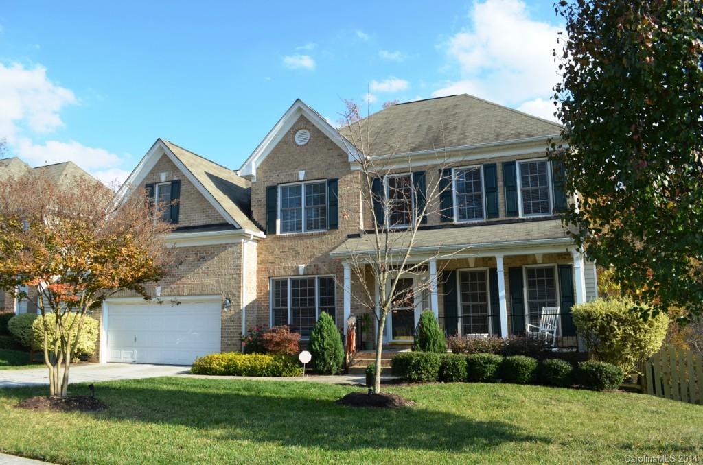 Fabulous house with 16 x 21 screened porch backing to wooded common area. Charming front porch. Study with French doors. Kitchen with black appliances, granite countertops and hardwood floors is open to the large great room with gas log fireplace. Guest bedroom with full bath on the main level. Master suite with tray ceiling and deluxe bath with dual sinks, separate shower, garden tub and huge closet. All secondary bedrooms have large closets. Huge storage loft in garage. 13 month home warranty.