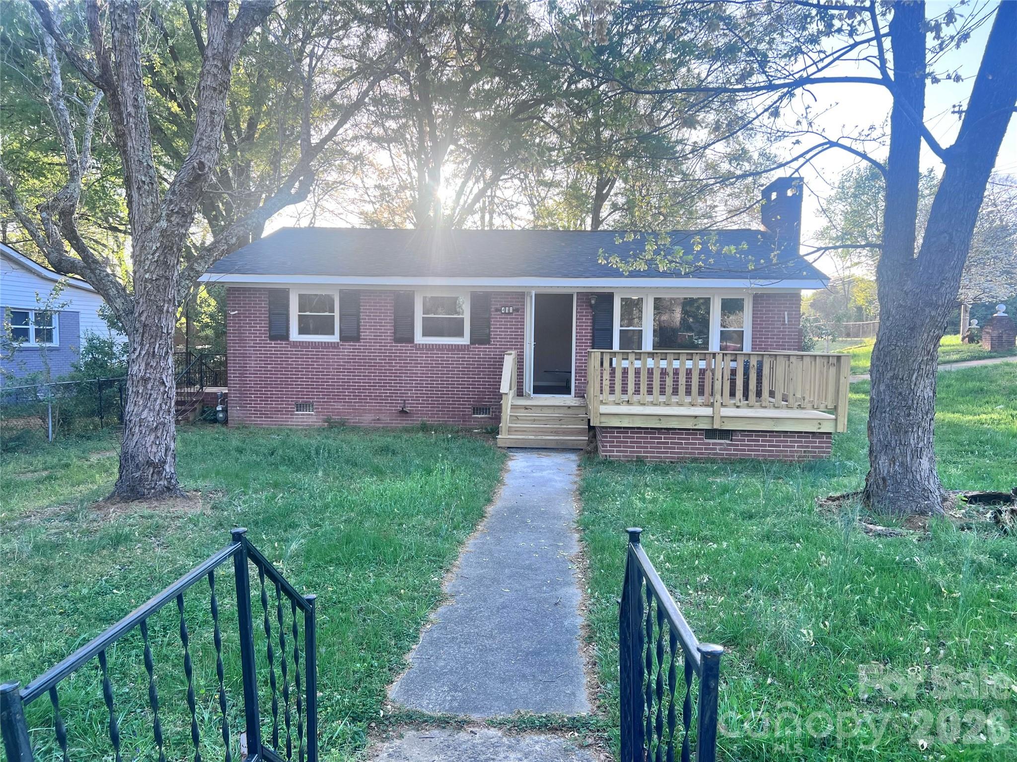 Welcome to this beautifully remodeled 2-bedroom, 2-bathroom brick home located at 400 Chatham Ave in the heart of Gaffney, SC. Situated on a spacious corner lot, this inviting property is a perfect blend of modern updates and classic charm.
Inside, you’ll find a thoughtfully updated interior featuring new cabinets, countertops, fixtures, doors, windows, flooring, and a fresh roof. The open floor plan creates a bright and comfortable living space which is both relaxing and entertaining.
At the heart of the home, you’ll find a spacious kitchen offering generous counter space, abundant cabinetry, and modern finishes—perfect opportunity for everyday living and hosting guests.
The home also features generously sized bedrooms, well-appointed bathrooms, and large windows giving warm light.