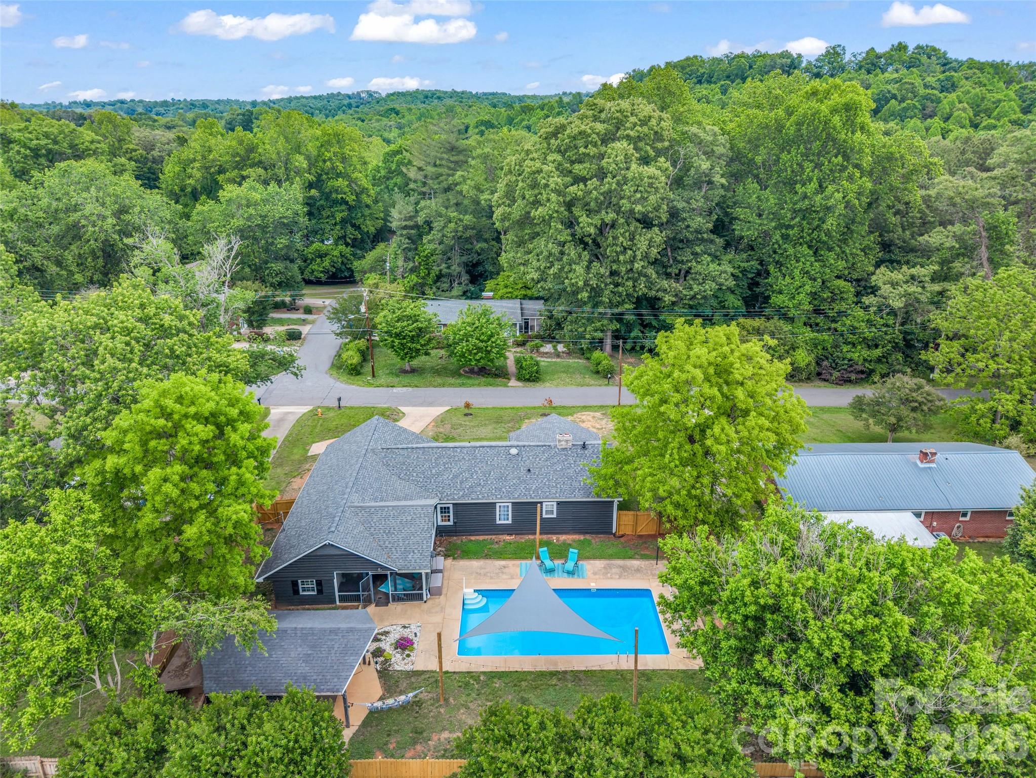 Welcome to your own private retreat where comfort, entertainment, and character come together in one
unforgettable property. This spacious 4-bedroom home or 3-bedroom with dedicated office space is designed
for both everyday living and effortless entertaining. Step outside to enjoy the impressive 20x40 in-ground
pool featuring a new pool pump, surrounded by a brand-new privacy fence for the ultimate backyard escape.
The outdoor living spaces are truly exceptional, complete with a pool cabana, screened-in porch, and
bright sunroom perfect for relaxing year-round. Music lovers and entertainers alike will appreciate the
unique outdoor hookups for amps and guitars, creating the perfect setup for live music nights under the
stars. Adding even more charm and history, the home is said to have once belonged to George Jones’ sister in-law. Inside, you'll find peace of mind with a Home Hub security system and the convenience of all new
appliances replaced in 2024. Whether you're hosting poolside gatherings, enjoying quiet mornings on the
porch, or creating your own music-filled memories, this property offers a lifestyle unlike any other. Minutes to downtown Rutherfordton and Crestview Park this one won't last long!