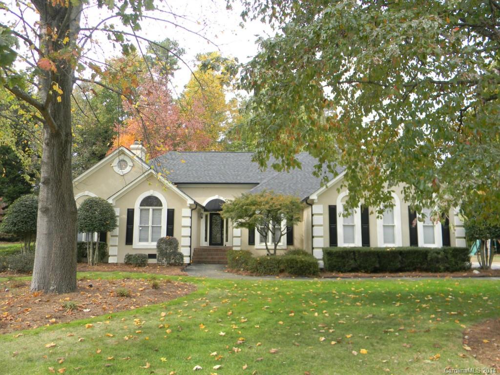 This stately home situated on a beautiful half acre setting in a culdesac has all the expected current upgrades.Hardwd & slate tile flrs give a rich texture to the warm atmosphere the vauled ceilings & open flr plan create,skylights & leaded glass front door provide natural light.Master suite offers a relaxing bath in front of the FP & opens onto screened porch.Garage has wrkshop & fixed staircase to walk-in attic w/tons of stge.Lge deck overlooks natural backyard. Stucco inspection completed.