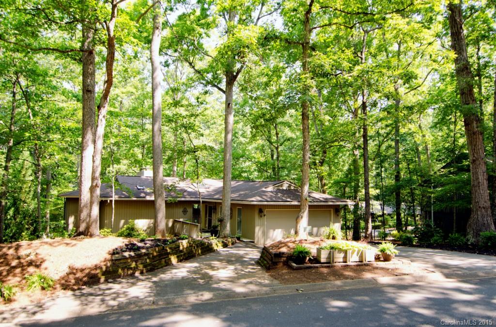 Entertaining is a breeze with this open design! You will be delighted from the moment you enter with the unique floor plan this home has to offer. Beautifully maintained with updated kitchen and bathrooms.  Huge master on the main with romantic fireplace! Extensive decking upper and lower. Mature trees in fenced back yard.  Enjoy all the amenities that River Hills has to offer...24 hour security, walking trails, children's playground, waterfront park!  Don't miss it!