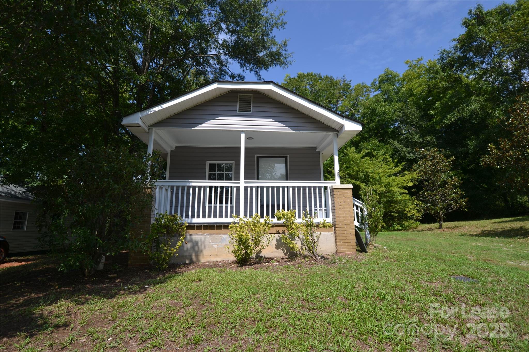 Come home to this lovely Bungalow style home with rocking chair front porch. LVP floors throughout. Home has family room at the front of the home. Kitchen with Electric range and refrigerator. Rear area has full bathroom and Laundry closet with W/D hookups. A long the main hallway are two ample size bedrooms. Private back yard. Pets are conditional and must be approved.