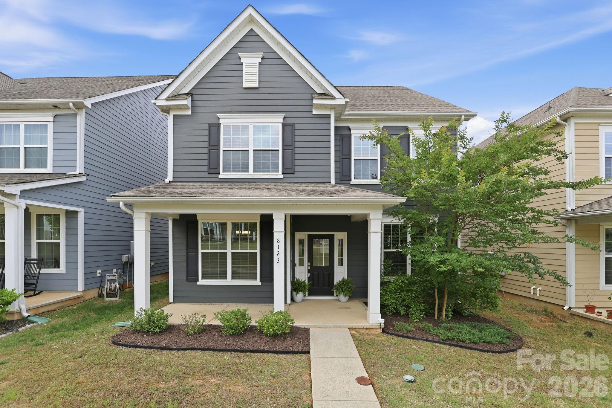 Welcome to this meticulously maintained, move-in ready home in the highly desirable Rea Farms community. Designed with both comfort and functionality in mind, this spacious home features an open-concept floor plan with 5 bedrooms, including a convenient main-level guest bedroom, 3 full bathrooms, and a large detached 2-car garage.

The gourmet kitchen is the heart of the home, showcasing stainless steel appliances, quartz countertops, and an oversized island perfect for entertaining. Abundant natural light fills the home, while the dedicated formal dining room adds elegance for everyday living and special gatherings alike.

Enjoy the lifestyle of a true Live, Work & Play community with walkability to neighborhood green spaces, Rea Farms Village, Harris Teeter, restaurants, LifeTime, and Rea Farms STEAM Academy. Conveniently located directly across from Waverly, just minutes to Blakeney Greens, and offering quick access to Interstate 485 for an easy commute.
