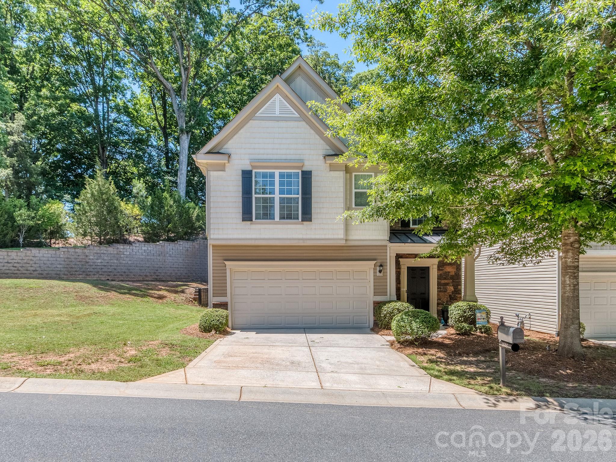 Welcome to this spacious 3-bedroom, 3.5-bathroom home in the gated community of Park South Station. Offering nearly 2,600 square feet, this thoughtfully designed floor plan features a private ensuite bathroom for each bedroom. The Primary bedroom is complete with dual walk in closets and a flex space perfect for an office or seating area, with direct access to a private balcony.

Located on a quiet dead-end street with extra parking, this home enjoys a desirable setting with convenient access to additional parking nearby. The kitchen has been tastefully updated, while a dedicated bar area creates the perfect space for entertaining. The exterior spaces include a partially covered and extended back yard patio and fenced back yard. Yard maintained by the HOA. 

Residents of Park South Station enjoy access to a community jr. olympic swimming pool, clubhouse, fitness center, tree-lined sidewalks, dog park separated by large and small dogs, a playground, a recreational green space, direct access to the little sugar creek greenway, and an active social committee with regular food truck rotation and quarterly events. All of this just minutes from SouthPark, the Light Rail, shopping, dining, and major commuter routes.

Combining space, privacy, and, an exceptional location, this home offers an outstanding opportunity in one of South Charlotte's most sought-after communities.
