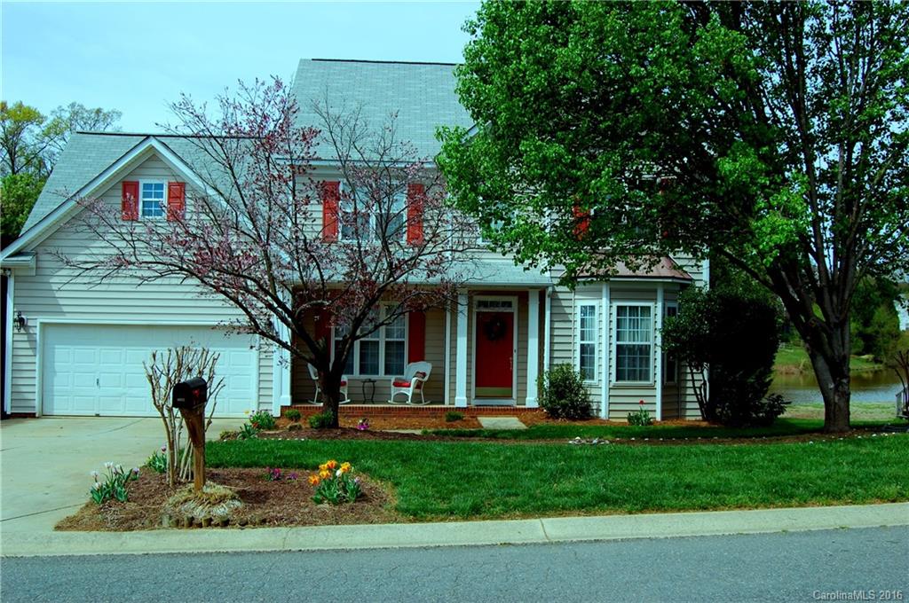 Bring your fishing poles! Traditional floor plan with formal living room that can be an office/study and formal dining.  Open kitchen with eat-in breakfast area and family room.  Laundry on main floor and attached two car garage.  Large deck that opens out to a gorgeous view of neighborhood pond and fenced back yard.  You will love this location!  A-rated schools.  All bedrooms and bonus room upstairs. Master suite features a sitting area. Great house!  Great price!
