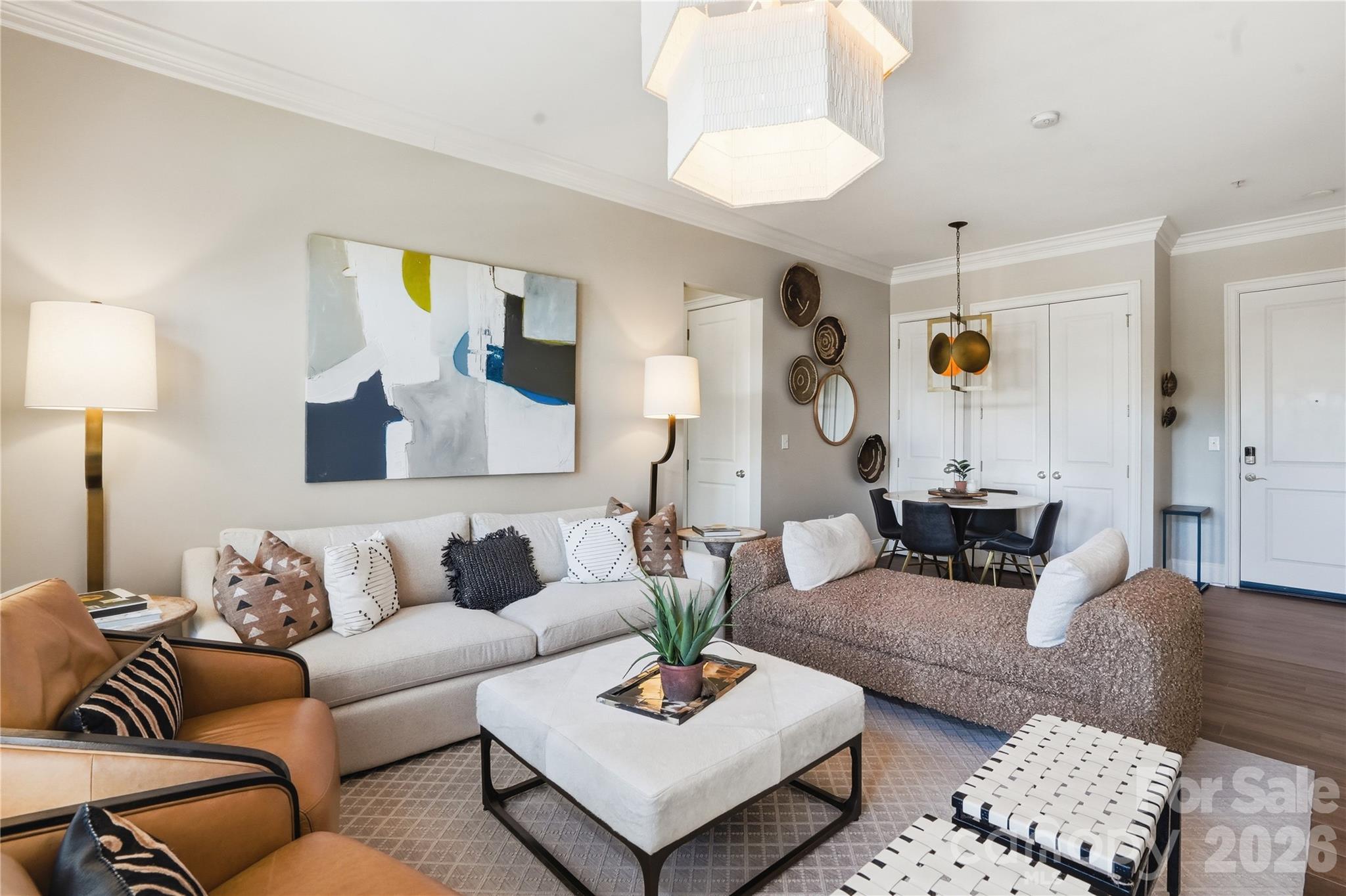 Location truly is everything at Selwyn Terrace—and this top-floor condo delivers. Situated in a secure building, this beautifully maintained home features luxury vinyl plank flooring throughout and a bright, open layout with 10-foot ceilings, crown molding, plantation shutters, and a custom built-in entertainment center with ample storage.
The kitchen is both stylish and functional, offering generous cabinet space, granite countertops, a tile backsplash, stainless steel appliances, and under-cabinet lighting. The spacious primary suite includes a private bath with a double vanity and a large walk-in closet, while a second bedroom provides flexibility as a guest room or home office.
Step outside and enjoy one of the area’s biggest draws—walkability. You’re just a block away from local favorites like Reid’s Fine Foods, The Jimmy, and Selwyn Pub, along with the shops and dining at Park Road Shopping Center. The nearby Little Sugar Creek Greenway adds even more lifestyle appeal.
Conveniently located to SouthPark, Uptown Charlotte, Interstate 77, and Charlotte Douglas International Airport, this home offers the perfect blend of comfort, convenience, and location.
Condo was photographed while sellers lived there. Furniture has been removed.