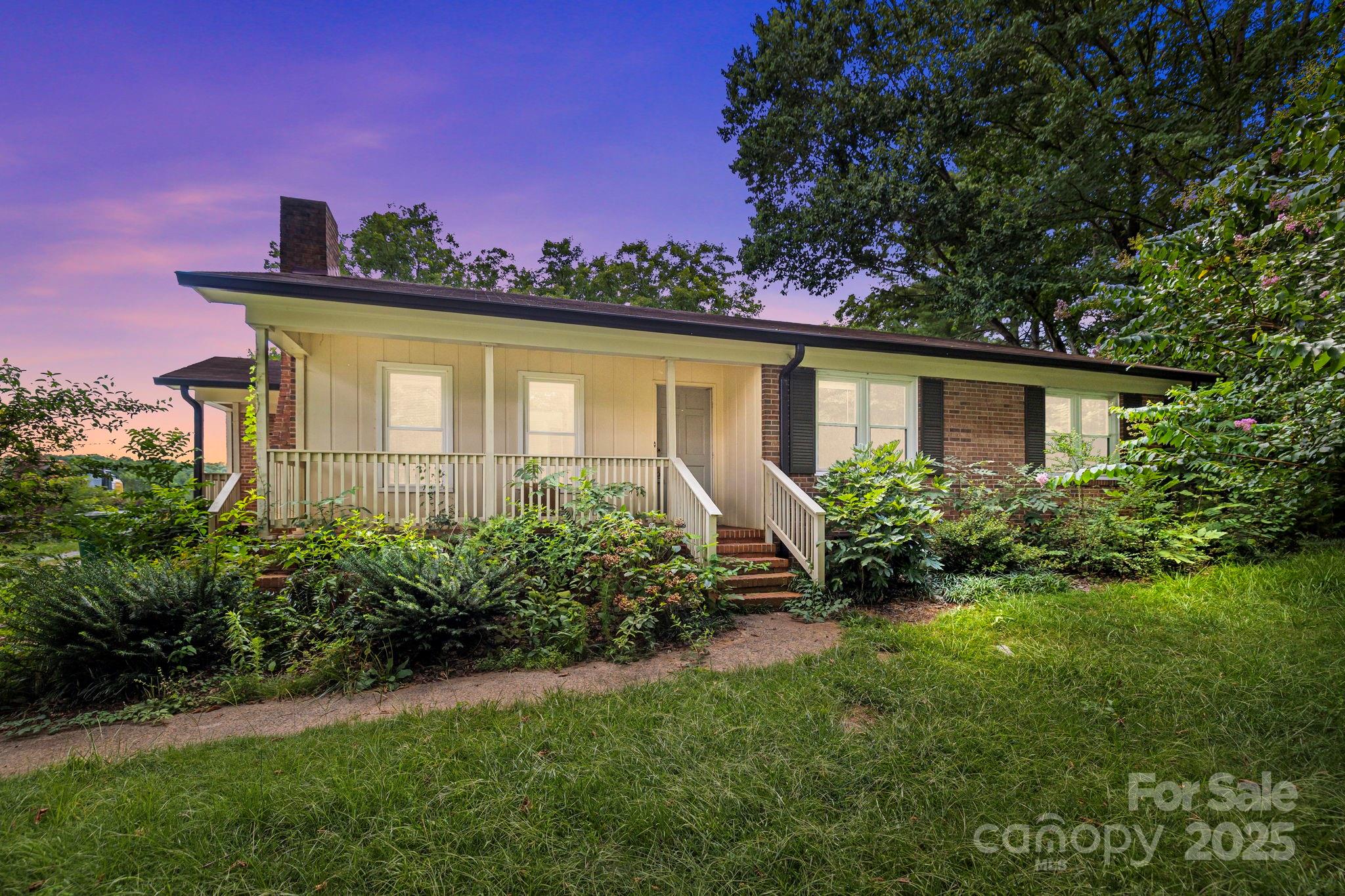 Nestled on a generous 1.61-acre lot, this well-maintained brick ranch home offers a peaceful, rural ambiance with modern comforts. Move-in ready, it features a spacious open floor plan with a welcoming family room centered around a cozy fireplace. The home includes a charming front porch and a back deck perfect for outdoor relaxation. Inside, you'll find well-kept hardwood floors, ceramic tile, and carpet, complemented by elegant granite countertops in the kitchen. A separate laundry room with cabinetry adds functionality, and ceiling fans enhance comfort throughout. The expansive backyard is ideal for outdoor activities or gardening. Previously a successful rental, this home is ready for its next chapter. Please remove shoes on the front porch to preserve the flooring. Ask about our free interest buy downs and huge savings with preferred lender.