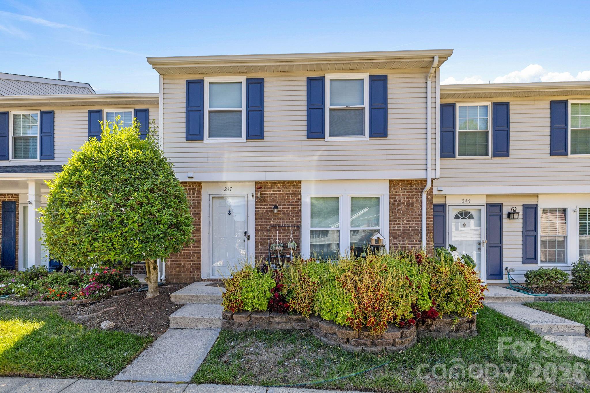 Welcome to 247 Water Oak Drive, a beautifully updated 3-bedroom, 2.5-bath townhome in Pineville, NC, offering low-maintenance living just minutes from Historic Downtown Pineville, Carolina Place Mall, and a short drive to Charlotte.

Inside, you'll find new luxury vinyl plank flooring throughout, creating a fresh, modern feel from top to bottom. The updated kitchen features white cabinetry, granite countertops, and plenty of cabinet space for everyday living and entertaining. The spacious living room is anchored by a beautifully updated fireplace, while the removal of popcorn ceilings throughout the home (excluding the owner's suite) provides a clean, contemporary finish.

Step outside through the new glass back door to your private, fenced backyard, the perfect space to relax, entertain, or enjoy low-maintenance outdoor living. An attached exterior storage closet provides additional space for seasonal items and outdoor equipment.

This sought-after Pineville community offers amenities including a community swimming pool, playground, and scenic pond. Conveniently located near Historic Downtown Pineville, Carolina Place Mall, Atrium Health Pineville, Ballantyne, and Uptown Charlotte, you'll enjoy quick access to shopping, restaurants, parks, entertainment, and major highways including I-485 and I-77, making commuting throughout the Charlotte metro area easy.

If you're searching for an updated townhome in Pineville with modern finishes, community amenities, and an unbeatable location close to Charlotte, 247 Water Oak Drive is one you won't want to miss.