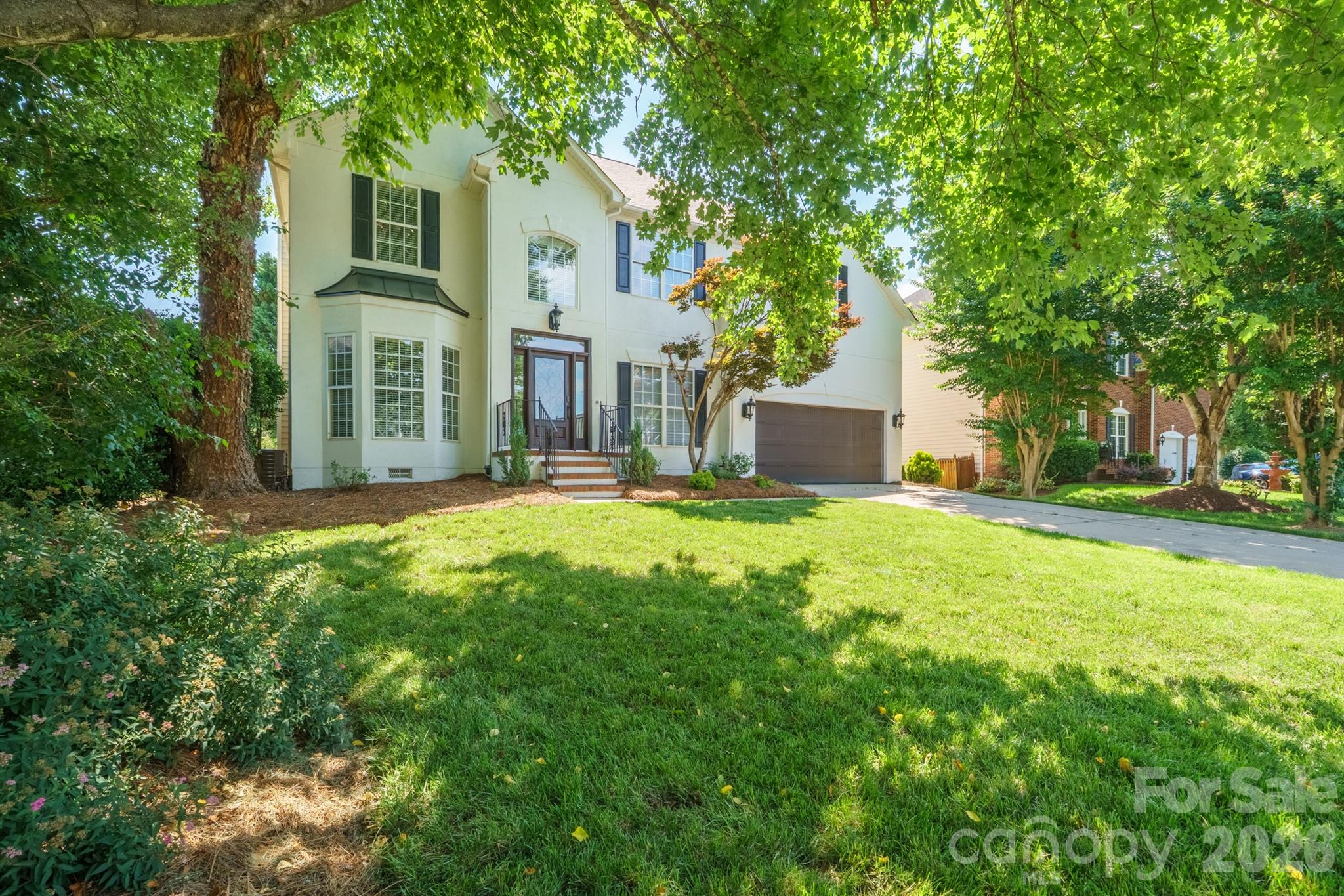 Welcome to this beautifully maintained home in the highly sought-after Northstone Club community in Huntersville! This spacious residence features an open floor plan with a dramatic two-story great room filled with natural light. The updated kitchen and bathrooms, refinished hardwoods on the main level, and luxury vinyl plank flooring upstairs. Freshly painted exterior stucco and interior.
With 4 generously sized bedrooms, including a spacious primary suite with a custom walk-in closet, there’s room for everyone. The main-level flex room makes a perfect home office.
Step outside to your private backyard retreat—ideal for entertaining—with a large deck, patio, built-in outdoor BBQ kitchen, hot tub and a gas-assisted fire pit. Additional upgrades include a newer energy-efficient HVAC system, a new roof, custom cabinetry, smart thermostats, and an in-home water filtration system.
Enjoy everything the Northstone lifestyle has to offer—beautiful walking and biking areas, plus access to the private Northstone Club featuring optional memberships for golf, tennis, dining, outdoor pool. The neighborhood also has a playground/recreation area. This home is a must see in your search for the perfect place to live! PREFFERED LENDER OFFERING $3000.00 TOWARD YOUR CLOSING COSTS!