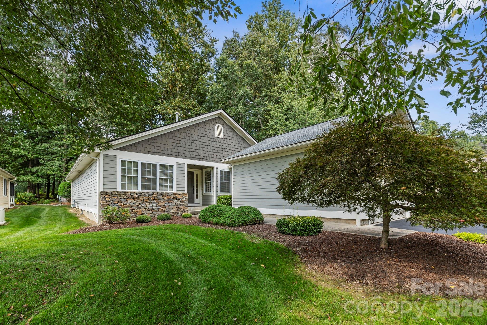 Welcome to this charming 3-bedroom, 2-bathroom home in the peaceful Etowah Golf Villas community! With 2,049 sq. ft. of comfortable one-level living, this home offers plenty of space to relax and entertain. Plus, a brand-new roof was installed in 2025, so you can feel confident in the quality of the home.

One of the best perks? The community takes care of the tough stuff for you – the grass is mowed, and your trash is picked up. That means you get to enjoy all the benefits of a low-maintenance lifestyle while surrounded by gorgeous, well-kept grounds. The location strikes the perfect balance between convenience and seclusion. You’re just a short drive from restaurants and grocery stores, but still tucked away in a serene, country setting. Whether you're a golf enthusiast or simply love the peace and quiet, Etowah Golf Villas is the perfect place to call home!