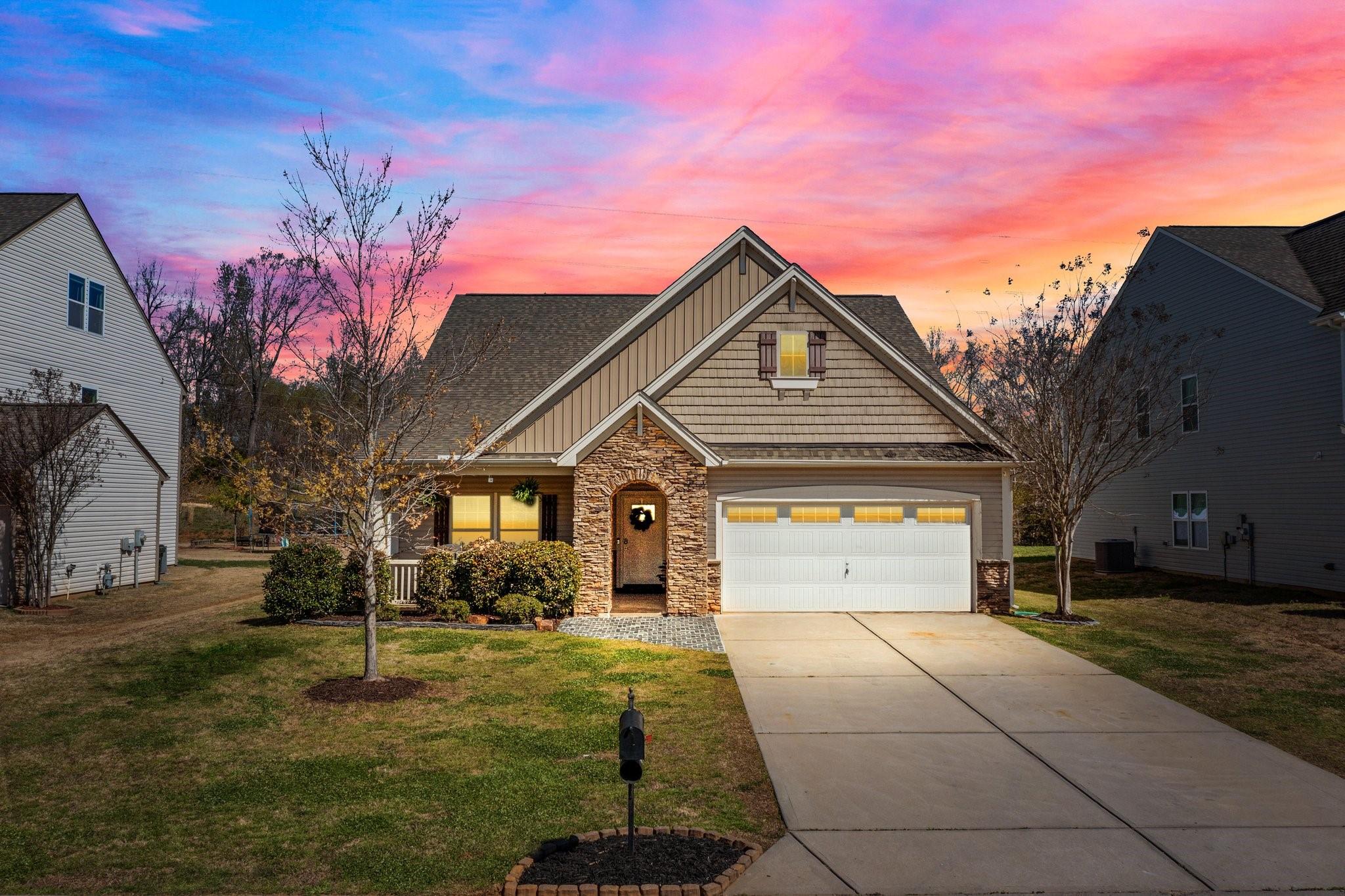 MOVE-IN READY home in a lovely community! This well-maintained home greets you with tall ceilings, new waterproof LVP flooring, fresh new paint and modern features. Enjoy the open floor plan with great space to entertain guests. The kitchen is equipped with a large granite island, stainless steel appliances, tall-pantry cabinet, a butler’s pantry AND a walk-in pantry. Spacious primary bedroom suite complete with bright sitting area for an office or flex space. The en-suite bathroom features granite countertop, walk-in closet and ceiling-high tiled shower/tub with a custom built in niche.  Second bathroom features a beautiful PREMIUM quartz vanity, shower/tub and tall ceilings. Large walk-in laundry room. Front rocking chair porch to drink your coffee or catch the afternoon sun in the fenced backyard and use the sunroom year round! Cool down in the neighborhood pool. Hike a nearby trail. Fabulous location within minutes to shopping, dining and entertainment. Better hurry! Check out VT!