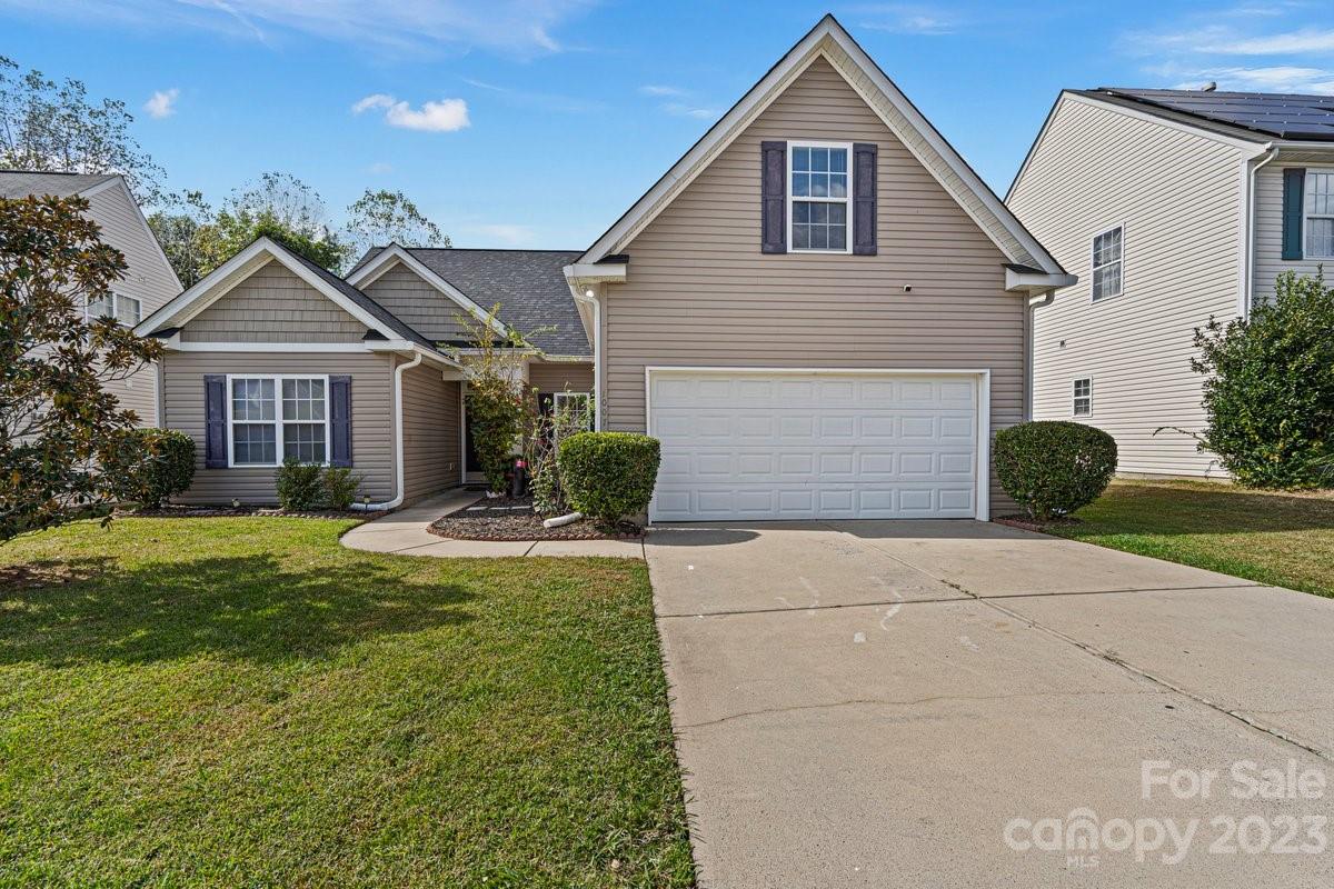 This BEAUTIFUL, 1.5 story OPEN concept home offers 1 primary suite, 2 well-appointed bedrooms, and 2 modern bathrooms on main level. 4th bedroom, loft, or office can take place of upper level bonus room. The kitchen boasts a contemporary aesthetic with NEWLY installed Quartz countertops, NEW microwave and stove. The kitchen island is a standout feature with bar-height setting. There is a formal dining area, and a generously proportioned living room featuring a vaulted ceiling and a cozy fireplace. The home has been Freshly painted providing a vibrant move-in ready feel. The front yard has an optional seating area, while the backyard offers a lush greenery backdrop. This home has a convenient two-car garage, adding to its overall appeal. NEW ROOF installed Aug 2023. Home has Leaf Guard. Buyers are welcome to keep washer & dryer. Home provides easy access to I-85, 485, and 77, enhancing your daily commute. PNC Pavilion, Concord Mills, Charlotte Speedway nearby. Schedule a showing today!