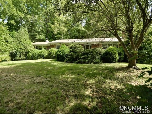 Solid brick Ranch on full unfinished basement, workshop space, & double garage in basement. Great storage in walk up attic space off hallway. Living room, dining room, & large family room. Great potential w/updating. Located near Mars Hill University. Mature landscaping & private setting. Seller says hot water heater is not functioning. Property is being sold through a Guardianship. Seller will make no repairs.