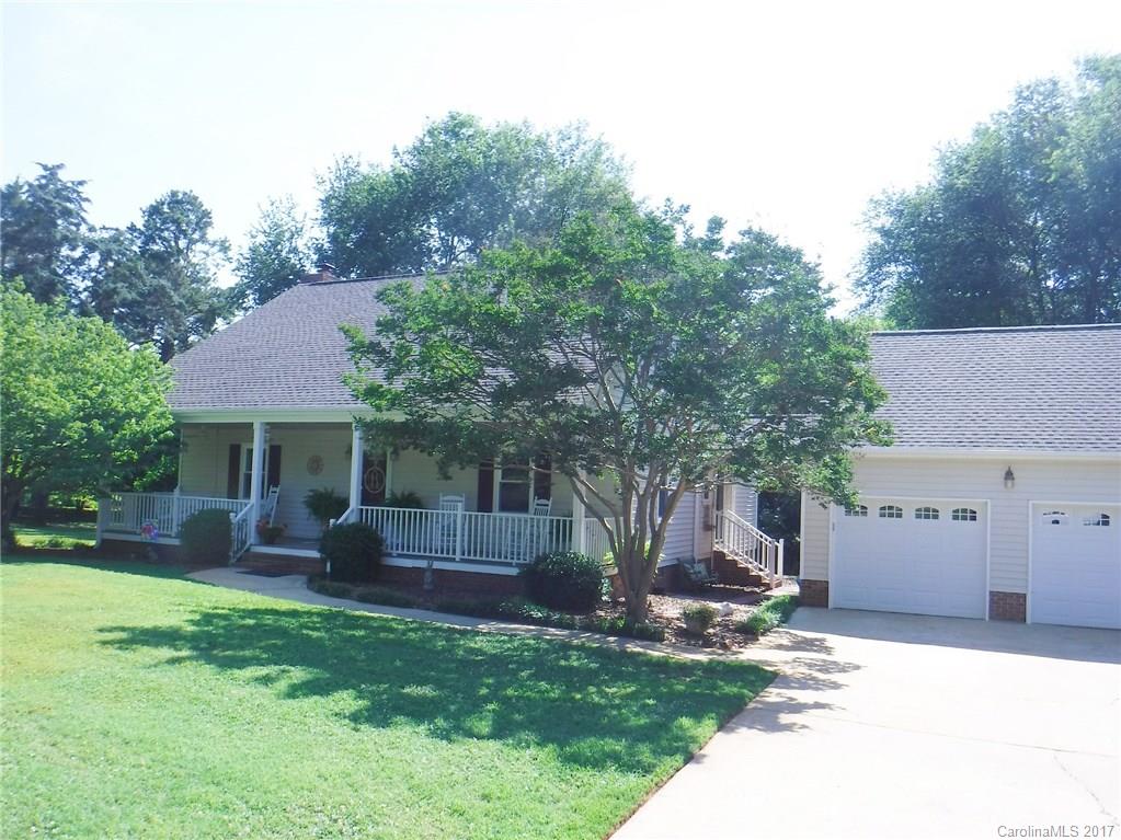 Immaculate "Southern Living Floor Plan" starts with a huge "Southern" front porch. Pergo abounds (no carpet). Master up plus a 1st floor BR/BA. Many updates includes roof, HVAC (both), Sedone counters, light fixtures, water heater. Large back yard, large covered and uncovered deck, oversized detached garage all situated on .86 of an acre. Storage and more storage! Near I-77 and more! NO CITY TAXES! 1 Yr 2-10 Home Warranty in place. HOME IS PENDING STILL SHOW - BUYER HAS A HOUSE TO SELL.