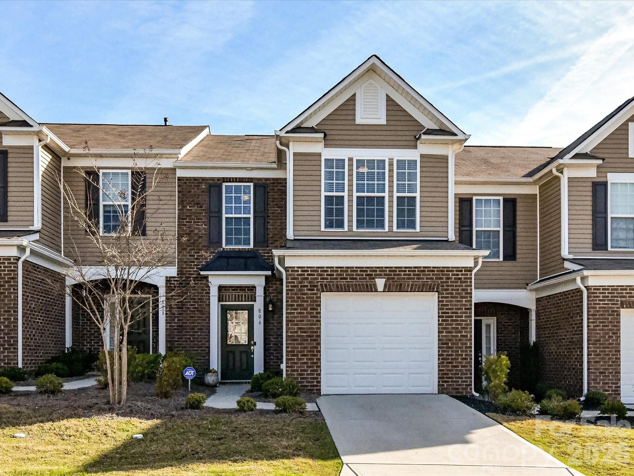 Adorable and Like New in Gated Community! Seller has made such nice updates in this immaculate home that include new lighting, featured wall in family room and attractive wallpaper in several rooms!  Kitchen has upgraded 42" white cabinetry, upgraded backsplash, popular quartz counter tops, ss appliances (including refrigerator)!  This charming townhome also has 5' walk in shower, tile and luxury vinyl wide plank flooring on the main level. Spacious master with walk-in closet and private en suite bath.  Don't miss this picture perfect home in Fort Mill!   One owner with no pets!  Catawba Village includes resort style swimming pool, walking trails and a clubhouse with access to Fort Mill's school district and low York county taxes.
