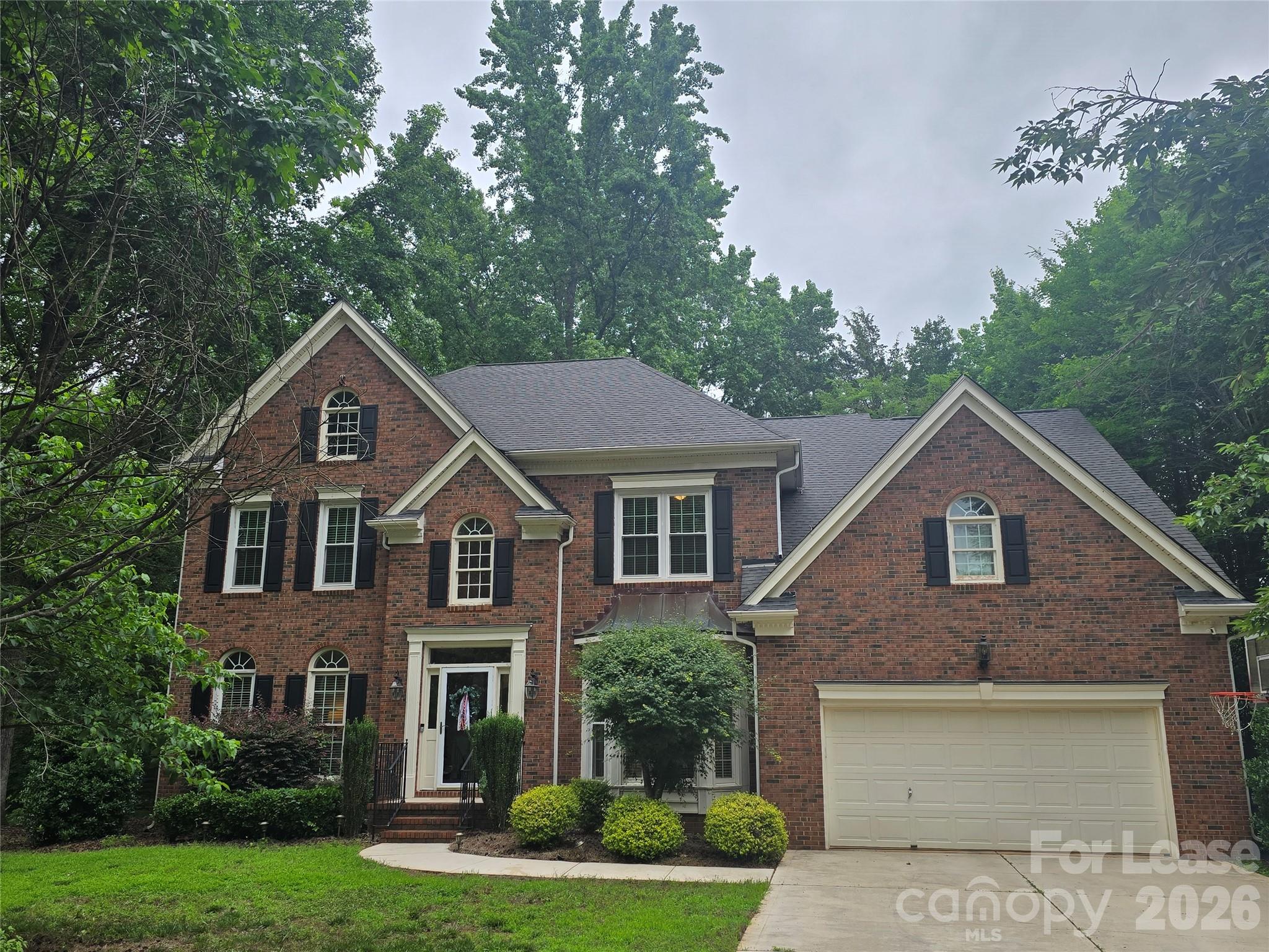 Welcome to Hunter Oaks! This immaculate brick home sits on over half an acre in a quiet cul de sac and is zoned for the popular Marvin Ridge Schools. The gourmet kitchen has a gas cooktop and wall oven, along with a convenient island for meal prep. Adjacent to the kitchen is a built in bar, great for entertaining and creates a flow between the formal dining room and the kitchen. Upstairs finds 5 spacious bedrooms including the primary suite with tray ceilings and a tranquil ensuite bath. Enjoy evenings on the deck in the fenced backyard- short walk to the neighborhood clubhouse too! Experience all Hunter Oaks has to offer while getting amazing space in this beauty. Available for showings after July 1.