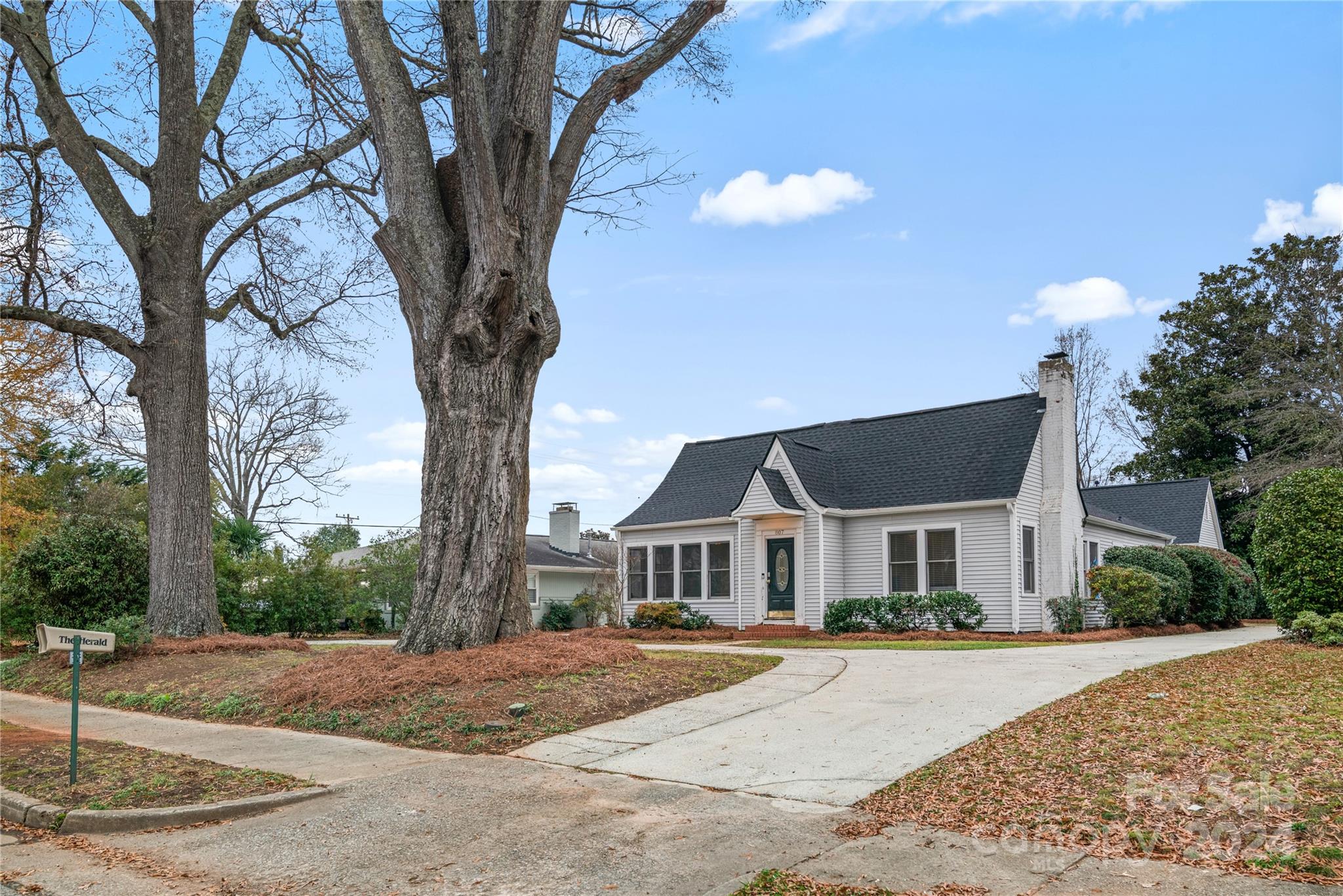 Welcome to 807 Milton Ave, a charming single-family home in the heart of Rock Hill. Built in 1948, this 2,500+ sq ft gem blends vintage charm with modern updates. It features 4 spacious bedrooms, 4 bathrooms, including a primary suite with a whirlpool tub, and real hardwood floors throughout most of the house. The kitchen boasts granite countertops, ample cabinets, a wine rack, and a separate prep sink area, perfect for any chef. The office/study showcases classic pine plank paneling and built-in shelves, ideal for working from home. Unique features include a solarium with a glass ceiling, stained glass windows, and a stunning design filled with natural light. Major updates include a new roof (2024), recent piping replacement, and two updated HVAC systems (2019, 2021). Conveniently located near Winthrop University, the coliseum, and local parks, this home is perfect for students and professionals alike. Don’t miss this timeless treasure with thoughtful updates! Sold as-is.