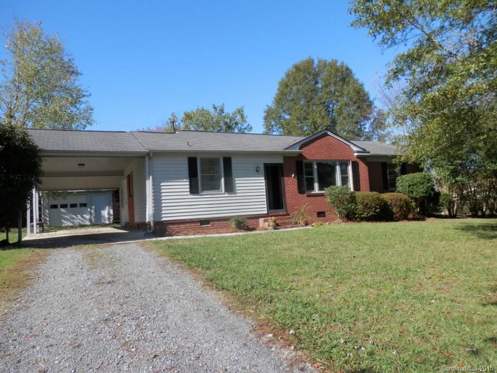This house is a must see! 3BR/2BA, hardwoods refinished and are beautiful, freshly painted interior, new kitchen counter, new dishwasher, eat-in area, laundry area, mud room, carport, brick/vinyl exterior, partially fenced yard, wood workshop, wired workshop. Great home. Close to schools, I-77 and shopping!  Corner lot.