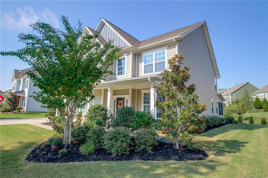 Enjoy your morning coffee on the front porch of this young 4/5BR spacious home in desirable, Amenity Rich Springfield Golf Community. Master suite on main, light filled great room, gorgeous kitchen wi/island, breakfast bar butler's pantry, home office w/french doors, formal dining room. Bonus room can be used as 5th BR. Recently planted 7ft Arborvitae's & Camellias along screened back porch making for a private, beautiful setting. Interior Arches & grand entry way add charm to this unique home