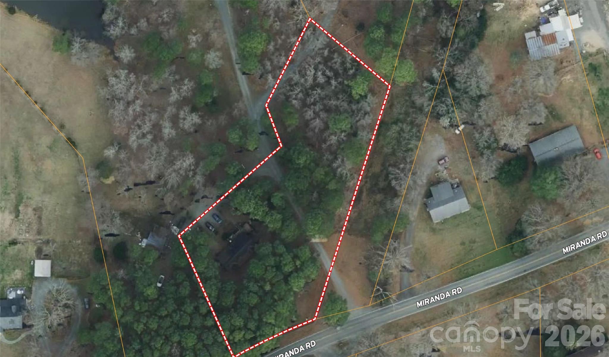 Three bedroom, three bath home with 2,376 heated square feet! It is located in a highly desirable area that is exploding with development. The property boast paved road frontage on Miranda Rd with city water and sewer are currently at the site. The topo lays well setting this property up perfectly for development or a private estate. Can be bought with neighboring property consisting of 9.88 acres with pond!  Call listing agent for additional details.