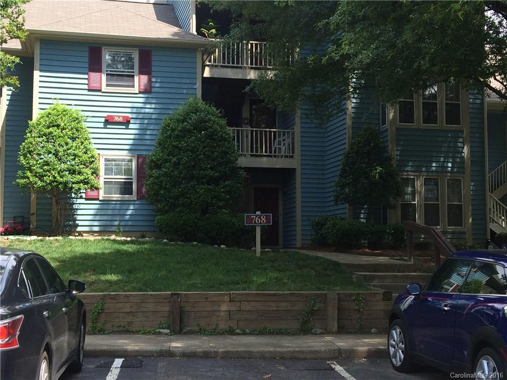 Great location just minutes to Uptown, Dilworth & Park Rd. Shopping Center!  Spacious 1 BR, 1 BA on ground floor.  Open floor plan.  Wood burning fireplace.  Bedroom features bay window.  Generous walk in closet.  Large laundry room.  Covered patio. Outside storage closet for extra storage. Lots of common areas and green space.  Pool. A short walk to the LYNX.  Seller to provide 1 year homeowner's warranty.