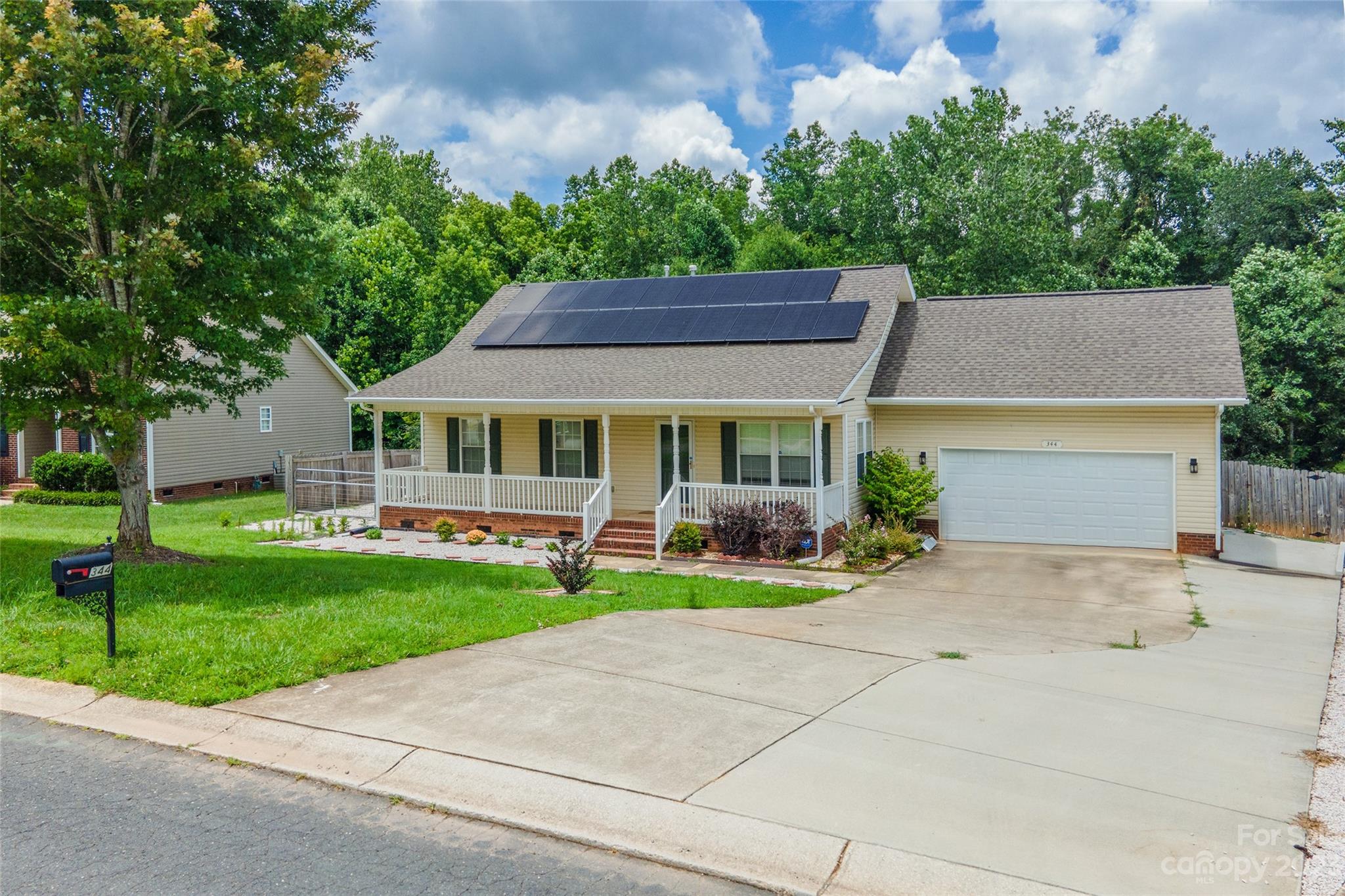 This well-manicured 3 bedroom 2 bathroom home is located in Clover and is sure to wow you! Plenty of parking space, large rooms with vaulted ceilings, and a meticulously landscaped yard are three of this home's most brag worthy features. This home has transferable solar panels and even a sunroom. The HVAC is newly replaced and the back yard is fenced in. This house has so many incredible features and is definitely more than meets the eye. A must-see in person!