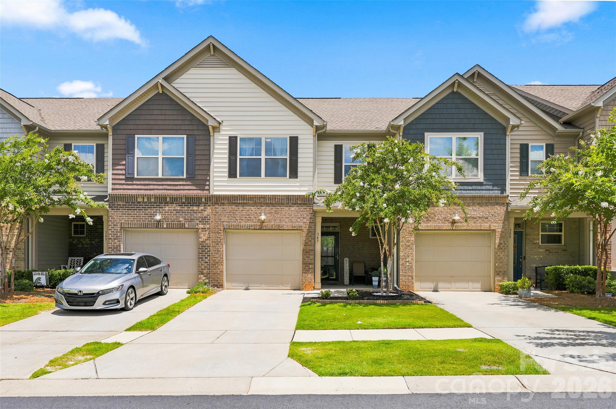 Welcome to this beautifully maintained townhome in the highly sought-after Waterside at the Catawba community. Offering approximately 1,700 square feet of thoughtfully designed living space, this two-story home features 3 bedrooms, 2.5 bathrooms, and a finished one-car garage.

The spacious primary suite serves as a true retreat, complete with a generously sized bedroom, large walk-in closet, and expansive en-suite bathroom. The modern kitchen is designed for both everyday living and entertaining, featuring a gas cooktop, ample storage, and a large pantry.

Step outside to enjoy the screened-in patio, creating the perfect space to relax year-round. Beyond the covered porch, an extended concrete patio provides additional room for grilling, outdoor dining, or gathering with family and friends.

Additional highlights include a convenient laundry area, well-appointed living spaces, and pride of ownership throughout. Located in a desirable community, residents enjoy access to outstanding amenities including a resort-style pool, fitness center, playground, baseball fields, and miles of sidewalks perfect for walking and enjoying the neighborhood.

With low-maintenance living, modern features, and an unbeatable community atmosphere, this move-in-ready home offers the perfect blend of comfort, convenience, and lifestyle.