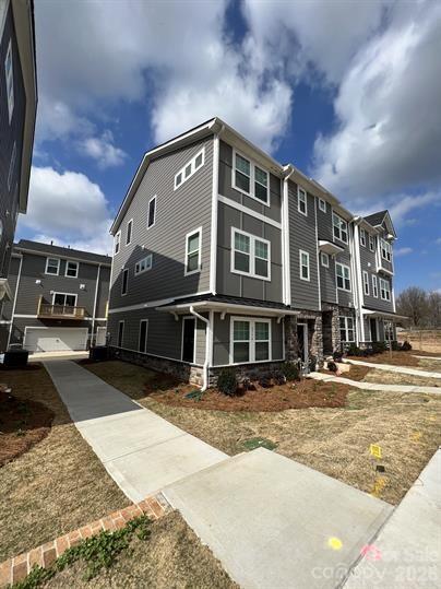 Beautiful 4 bedroom, 3.5 bathroom townhome located In Charlotte nc. This home is 3 stories and features incredible vinyl flooring throughout the first and second floor as well as lush, soft carpeting on the third. As you walk in the first floor you are greeted by the guest bedroom, which features its own full bathroom w/ a large shower. On the second floor you will find an open floor plan that connects the living room and kitchen beautifully. The kitchen features elegant quartz countertops, a gas range stove, and plenty of cabinetry space. All other bedrooms, including the master, are on the third floor. The master bathroom features a huge double vanity sink and tiled shower. The two extra bedroom have plenty of closet space and share an elegant full bathroom. 
This townhome is an end unit, making it more accessible to others, and brings in plenty of natural light. Located within a few miles of major shopping centers and plenty of dining options.
Nearby golf courses and Renaissance Park offer plenty of outdoor entertainment while easy access to I-485 and I-77 provides close proximity to employment centers, Uptown, and Charlotte Douglas International Airport
