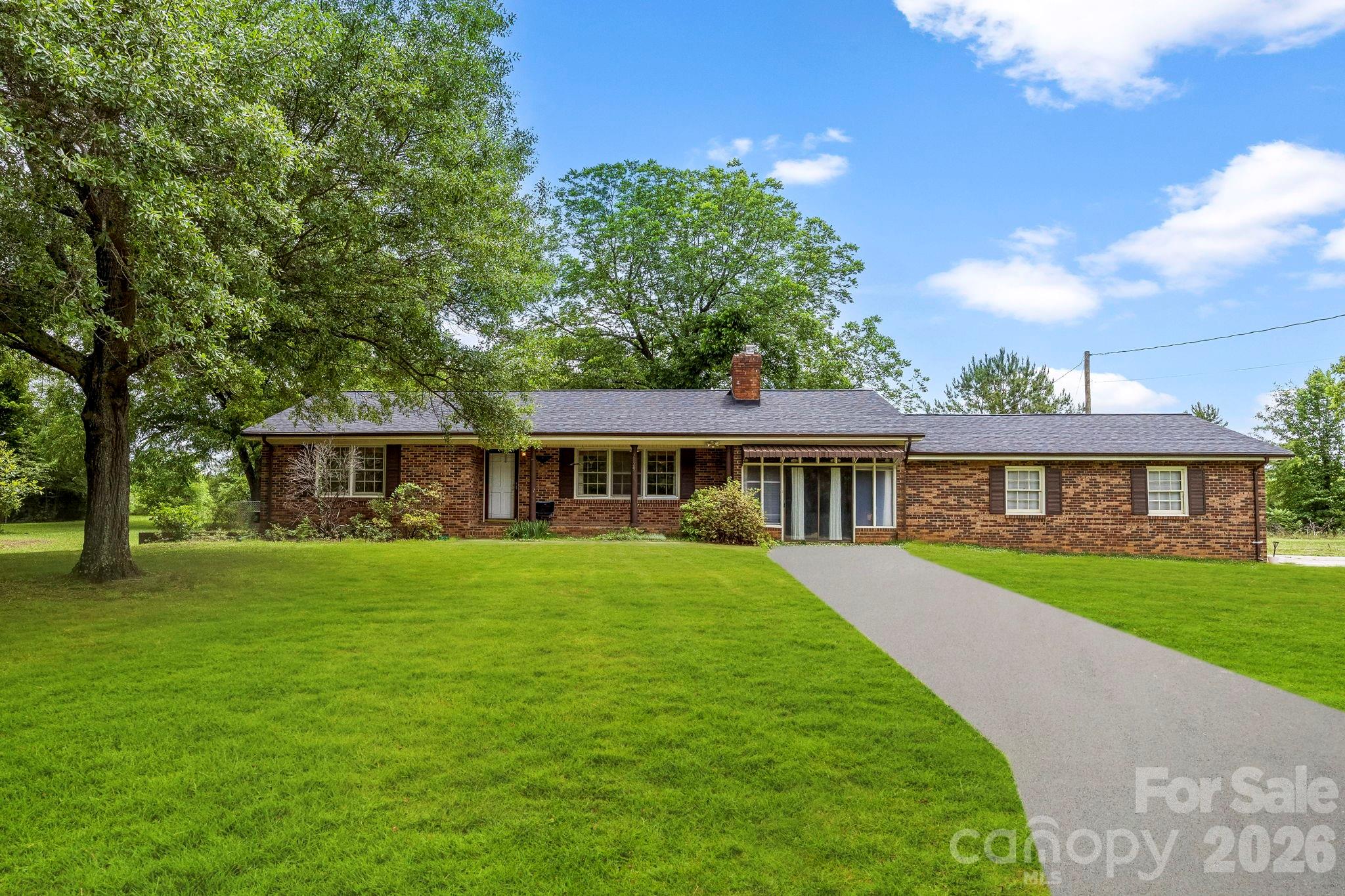 Great full brick, 3 bedroom, 2 full baths, 1.006 GIS Deeded Acres lot, and an attached 783 sq ft garage could be yours if you schedule a tour today.  The garage also has a 220 50 amp.  There are two possible driveways, paver walkway being added to connect them, and bonus area that could be a gym, play place, or office and includes a large utility room.  Hardwood floors and the rooms are very spacious.  The front porch is covered and the back yard has a great cement patio.  A portion of the backyard is fully fenced in already making it great for immediate use.  This home has 5 year old gas heat and it has a brand new roof. This location is quiet, yet super convenient to everything big city.  You have shopping, entertainment, schools, dining, you name, it's near.  Schedule your tour today.