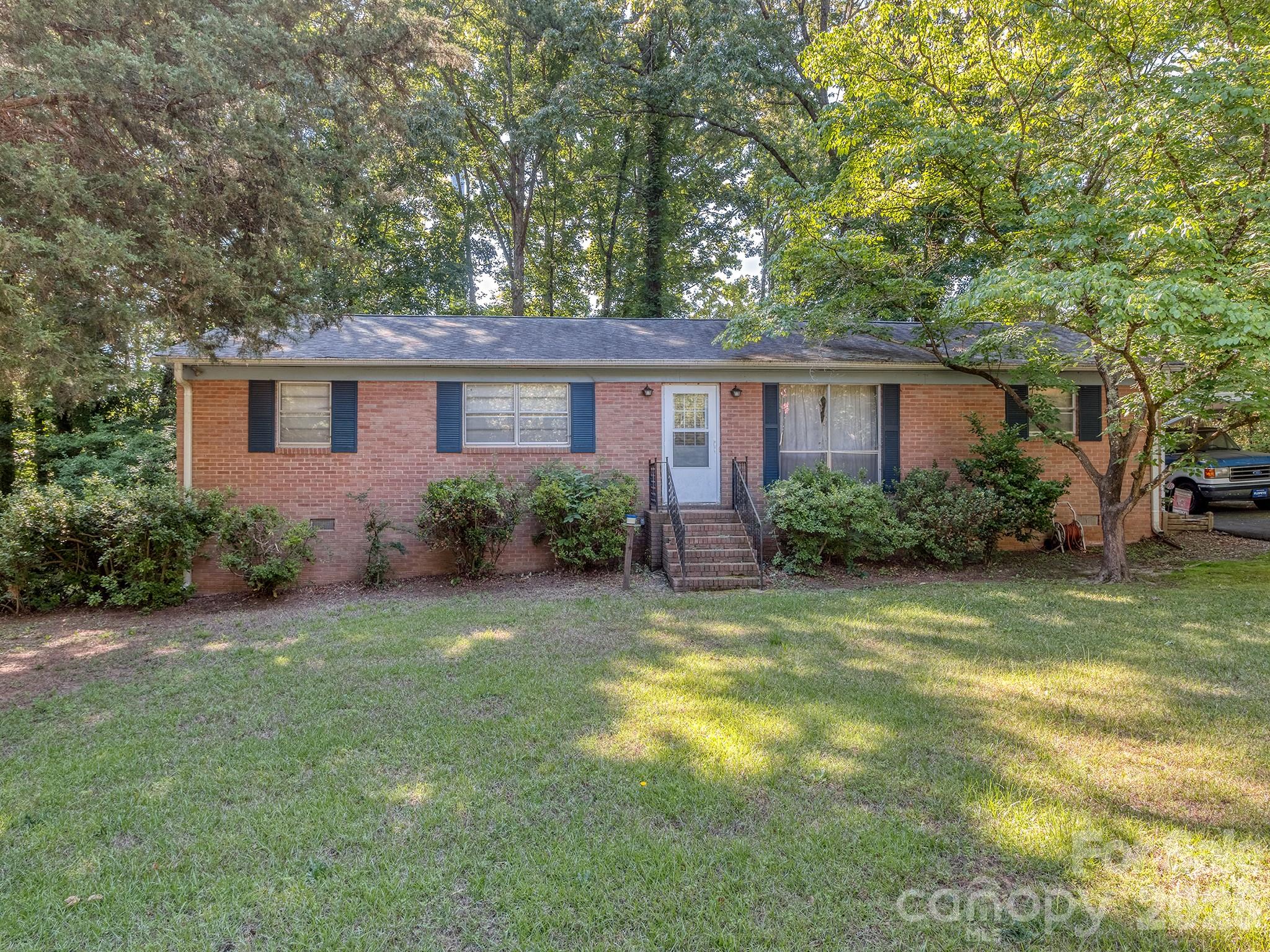 Rare opportunity in the Fort Mill School District. NO HOA and NO CITY TAXES! This all-brick home sits on approximately one acre on a low traffic cul-de-sac street, offering both privacy and a prime location near shopping, restaurants and tons of local amenities. Ideal for investors or buyers ready to bring their vision to life, this property is perfect for a full renovation or targeted updates. Surrounded by trees on neighboring lots, the backyard provides added privacy and a peaceful setting. Crawl space repairs are needed; a quote from reputable Tarheel Construction available upon request.