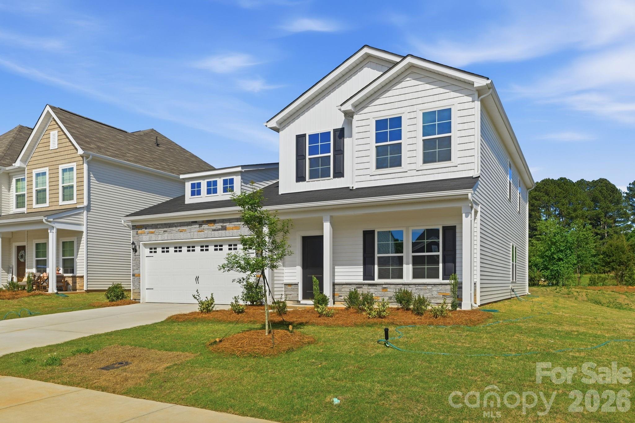 This spacious five-bedroom, two-story home offers a thoughtfully designed layout with the primary suite conveniently located on the main level. Upstairs, you’ll find four additional bedrooms, each with its own walk-in closet, and a shared well-appointed full bath. Just off the foyer, a flex room provides the perfect space for a home office. The open-concept kitchen, casual dining area, and family room create an inviting space ideal for everyday living and entertaining—with the option to expand outdoors with a rear covered porch. The primary suite features an optional vaulted ceiling, private bath, and generous walk-in closet. 
closing cost incentives with our preferred lender.