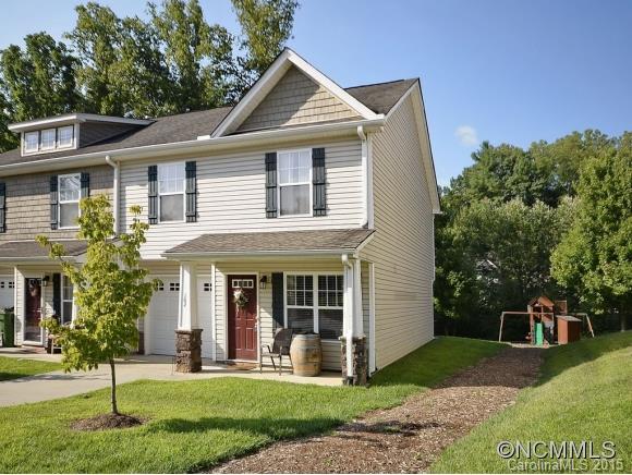 GORGEOUS - End unit townhome with open floor plan.  Living room features corner gas fireplace and hardwood floors.  Kitchen with eat in dining area and gas range. 3BR/2.5BA.  Patio. Single car garage and additional parking across the street.   Convenient location to dining, shopping, and I-26.