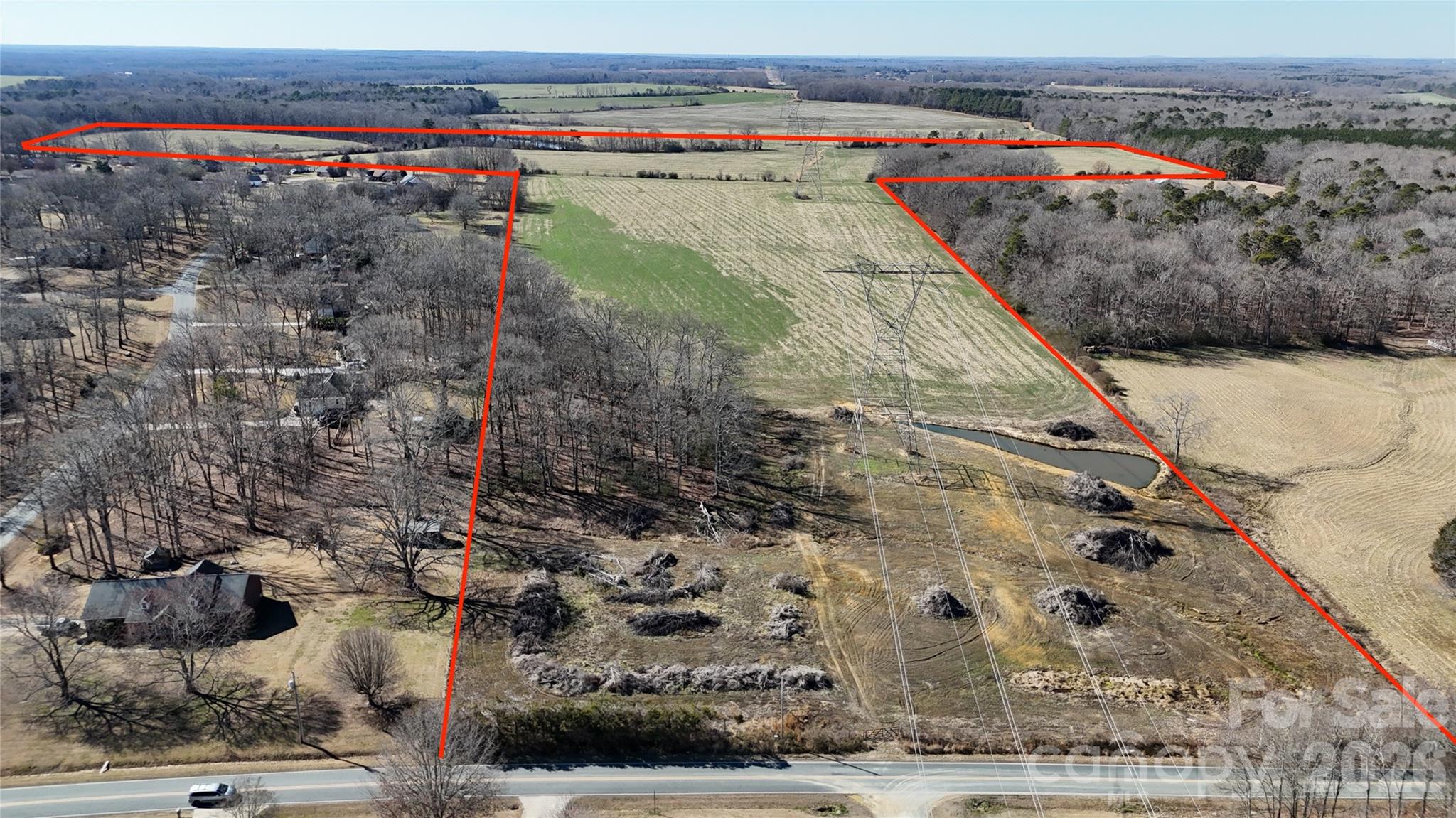 This 98 acres of land offers boundless opportunities for development, recreation, or investment. Whether you are developing a new subdivision, building your own private estate, or simply investing in land, this expansive property provides the perfect canvas. There is a power line on the front going down through the middle with plenty of buildable acreage. Minutes to Waxhaw and Monroe.