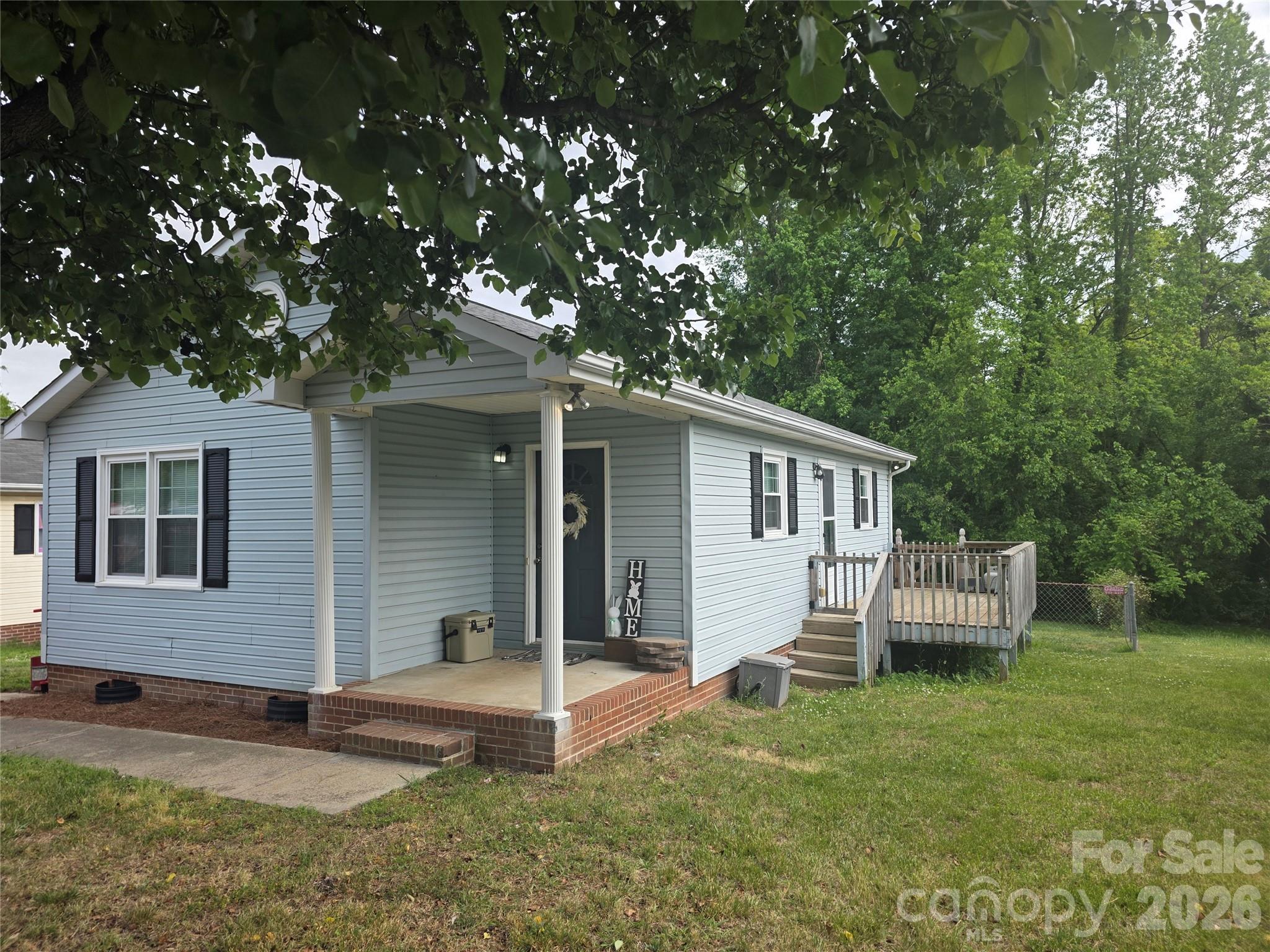 NICE !!!!! starter home or investment property. Nice size kitchen with plenty of countertop space, kitchen cabinets freshly painted, laundry closet. Deck area for grilling, big fenced in backyard storage building. New updated windows easy for cleaning. Convenient location minutes from I-85/Hwy 29-74 & the community pool. Don't miss out on this one!