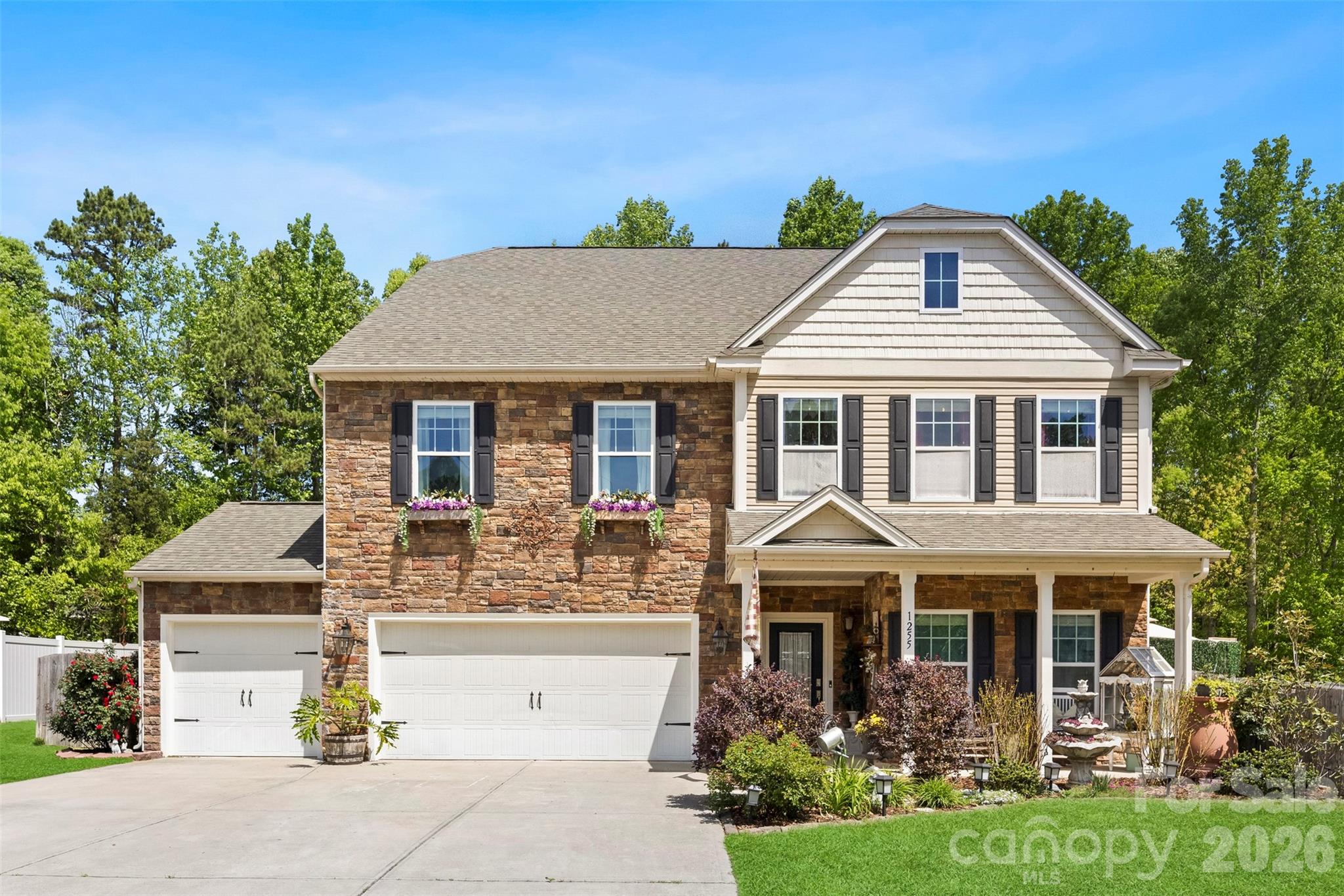 So much to love in this ONE-OF-A-KIND home that has been extensively renovated! It's located in the Oaks at Clover subdivision in the highly sought-after Clover School District and is just a few minutes from Lake Wylie. This home boasts 4512 sq ft, 7 spacious bedrooms, 3.5 baths, 3-car garage, storage shed, front porch, great room w/ open floor plan, gourmet kitchen with eat-in island, bonus/theater room with surround sound, office, breakfast area, dining room, drop zone, walk-in pantry plus your very own fenced-in backyard oasis w/ wooded views, large patio, gazebo, and a 16'x36' in-ground swimming pool plus hot tub! In the spring/summer a gorgeous hidden garden featuring beautiful blooming roses, azaleas and lilies! Finishes/features include 12mm water-resistant laminate wood flooring, fleck carpeting w/ upgraded pad, ceramic tile, stone travertine subway tile, stainless steel appliances, vented-out hood, touchless faucet, granite countertops, gas fireplace w/ stone surround and travertine hearth, brushed nickel fixtures, smart thermostats, doorbell/floodlight cameras...PLUS MORE!